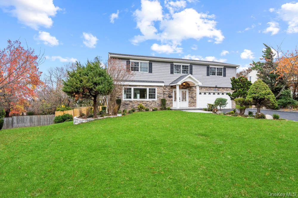 Welcome to 52 Woodland Road – Newly Renovated Luxury in Roslyn! Set on nearly half an acre in the highly rated Roslyn School District, this stunning 4,300 sq. ft. home offers 5 bedrooms and 4.5 baths with exceptional attention to detail throughout. The first floor features a spacious living room, formal dining room, and a den with fireplace. The brand-new chef’s kitchen boasts high-end appliances, a large center island with , and radiant heated floors that extend through the hallway, kitchen, powder room, and laundry room. Step out from the kitchen to a balcony overlooking the in-ground pool and enjoy sweeping views of Hempstead Harbor. Upstairs, you’ll find four generous bedrooms, including a primary suite with cathedral ceiling, walk-in closet, and a luxurious bath featuring radiant floors and a freestanding soaking tub. The second-floor hallway leads to a balcony with additional views of the backyard, pool, and harbor. The finished lower level offers a bedroom, full bath, and two walkouts to the patio and backyard, creating the perfect space for guests or extended family. With a private pool, multiple outdoor entertaining spaces, and breathtaking water views, 52 Woodland Road combines modern design, comfort, and luxury in one of Long Island’s premier locations.