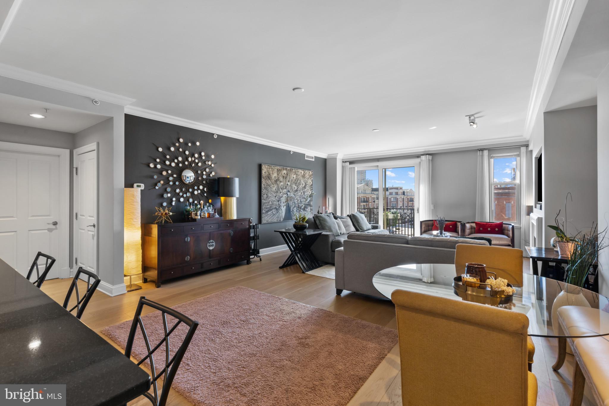 This stunning 1-bedroom, 1.5-bathroom residence at The Ritz-Carlton Residences with abundant natural light and sophisticated design spans over 1,500 square feet and features elevator entry leading into the spacious living space. The gourmet kitchen boasts granite countertops and premium stainless-steel Viking appliances, seamlessly flowing into the open dining and living areas. The living room is centered around a gas fireplace and opens to a comfortable multi-room balcony. The expansive primary suite offers a spa-like marble bathroom, two spacious walk-in closets, and additional access to the balcony.  Other features include two deeded parking and a separate storage space.  Enjoy beautiful sunsets and gorgeous views of Federal Hill. Residents enjoy world-class five-star amenities, including 24/7 concierge, valet, and security services, an indoor heated saltwater pool, a state-of-the-art gym with a movement room, a private theater, board and club rooms, guest suites, and more. Minutes away from Baltimore’s vibrant arts district, as well as Ravens and Orioles games and with convenient access to BWI, I-95 South, and Penn Station, this residence provides the perfect blend of luxury, comfort, and accessibility. Discover waterfront living at its finest at The Ritz-Carlton Residences. Photos are of model of the same floor plan.