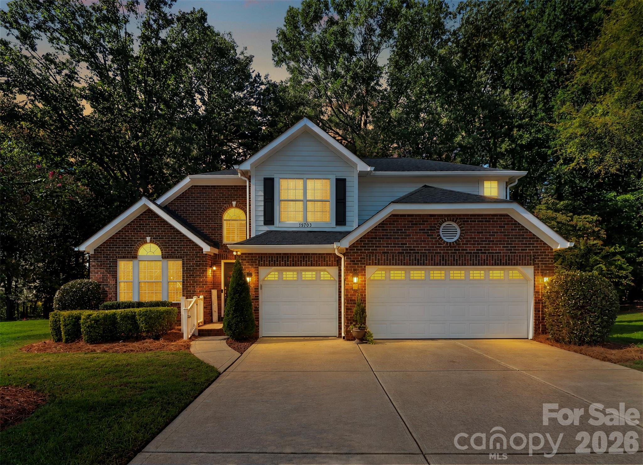 Welcome to this stunning, full-brick, 3-bedroom, 2.5-bath home on a quiet cul-de-sac in one of Huntersville’s most beloved communities, just minutes from Lake Norman and the shops, restaurants, and energy of Birkdale Village. Step inside to a two-story foyer flooded with natural light, featuring hardwood and brand-new LVP flooring throughout the main level. To the left, the dining room opens into a gorgeous kitchen with granite countertops, a tile backsplash, built-in microwave, and a sunny breakfast nook. The spacious great room, anchored by a gas fireplace, opens to the deck and the new screened-in porch, overlooking a private backyard ready for weeknight dinners and weekend gatherings alike. The main-level owner’s retreat is a true escape, with a vaulted ceiling, a sitting area, and a recently renovated primary bath featuring double sinks, a separate tiled shower, and a soaking tub. The renovated walk-in closet adds ample, beautifully organized storage. Upstairs, a loft overlooks the foyer and dining room, and two additional bedrooms share a full bath. A 3-car garage with plenty of built-in storage means room for the cars, the gear, tools, and the golf clubs. Life in Birkdale brings resort-style amenities to your doorstep: the neighborhood clubhouse, pool, tennis courts, and Birkdale Golf Club close by, plus easy access to everything Lake Norman has to offer. Immaculate, updated, and ideally located. Come see it for yourself.