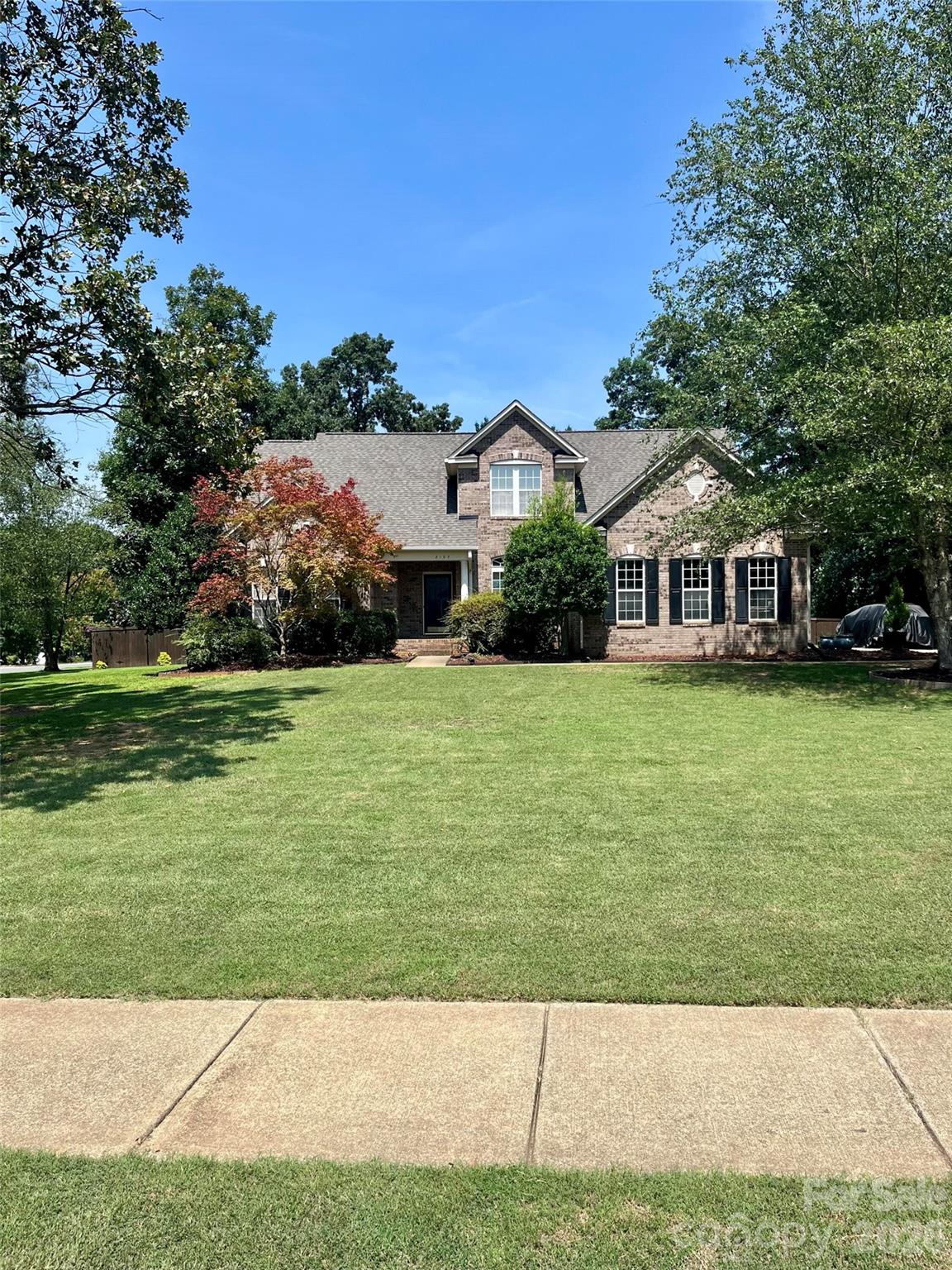 A rare find in a very desirable area surrounded by upscale development. Ranch-style home with a second-floor room featuring a large closet and en suite bath. Primary bedroom on the main with 3 other bedrooms. Open-concept floor plan with 10-ft ceilings and large updated kitchen. Prime wooded and level lot with 6-ft privacy fence and wired 20-ft utility building.