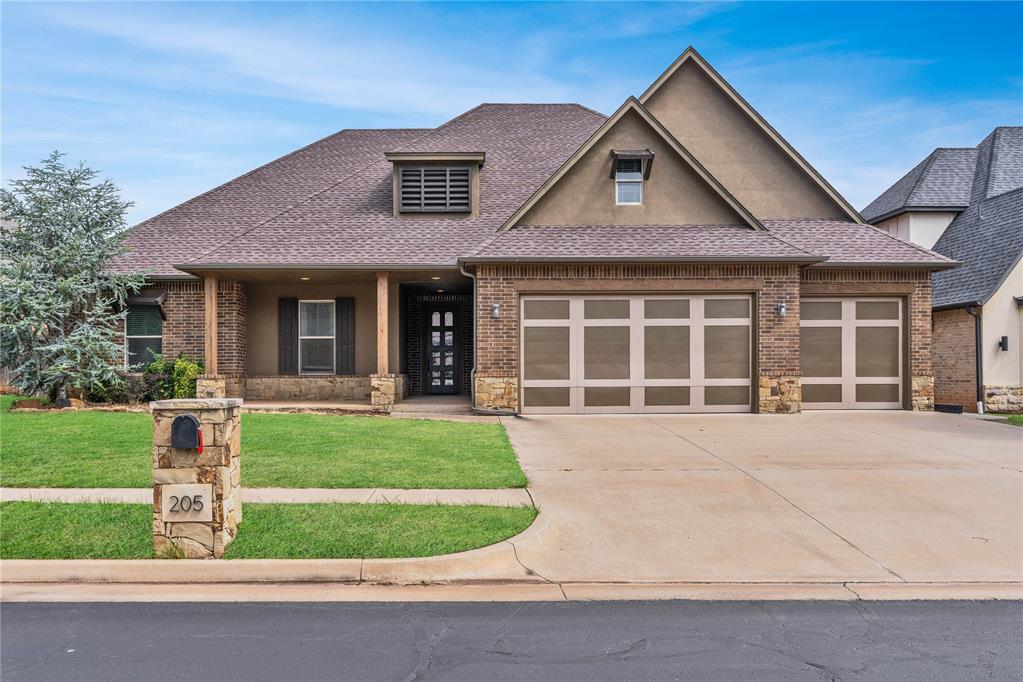 Located in the exclusive gated community of The Lakes At Traditions, this 4-bedroom, 3-bathroom home offers a perfect blend of elegance, functionality, and top-tier amenities. The spacious interior is highlighted by rich hardwood flooring and an expansive open-concept layout where the living, dining, and chef-inspired kitchen seamlessly connect—featuring granite countertops, a large center island, a stylish glass backsplash, and abundant storage. Thoughtful conveniences abound, including a dedicated mudroom with a built-in desk and bookshelves, a tankless hot water heater, an in-ground storm shelter safely installed in the garage, and a generous primary suite with a large walk-in closet that conveniently opens directly into the utility room. Outside, step onto a massive covered back patio ideal for outdoor entertaining, or venture out to enjoy resort-style neighborhood amenities including a clubhouse, fitness gym, community pool, dog park, and several stocked fishing ponds—all served by top-rated Edmond schools with quick access to the turnpike. Combining pristine craftsmanship with an unmatched lifestyle, this turnkey home is an absolute must-see—reach out today to schedule your private tour!