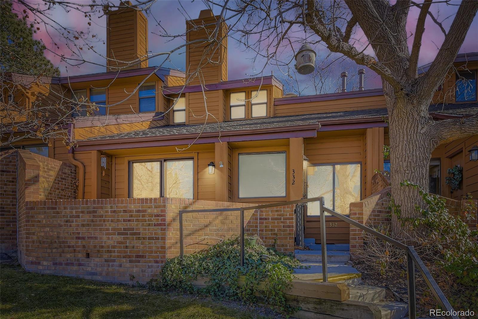 Save this one for last!  It's the nicest one you'll show.  Don't be frightened by HOA fees.  The Association policy covers structure, grounds and common area - you only need a policy for "walls in".  That's less than 1/10th the cost of a single family home. Contemporary 2-bedroom townhome with soaring ceilings, gorgeous slab granite, fluffy almost new carpet you can sink your toes into, and a view of sunsets from the front porch as you overlook the resort-like pool and spa area. You'll feel like you're at a Marriot hotel!  Lush greenbelt surrounds.  Owner shared no expense when he upgraded this home.  There are gleaming cherry soft-close cabinets throughout, stainless Samsung and Frigidaire appliances in the kitchen, including a 5-burner gas range with self cleaning oven, side-by-side giant refrigerator with storage drawer and lower drawer freezer, under counter lighting and a pass through to the dining room.  There's room for a kitchen table or add a display cabinet if you have lots of treasures.  There's a handy powder room for guests.  As you walk upstairs, you'll notice the unique angles and skylights and a long hall and wall which is a great place to display art or special photos.  There are two spacious bedrooms and the primary bedroom is massive!  Plenty of space for a king size bed, sitting area and all the accessories.  The elegant primary full bath area offers yards of granite counters, double sinks, sky lights, soaking tub and a giant walk-in closet.  The 2nd bedroom also has room for a king size bed.  The full size bath offers more granite and upgraded fixtures.  Moving to the finished basement, you'll enjoy the cozy rec room with an alcove that would be perfect for a bar or home office.  There are two storage areas and plenty of room near the laundry area to hang clothes and even a working toilet!  Furnace and water heater were replaced recently.  This home is ready to welcome its new owners with an ambience seldom seen.