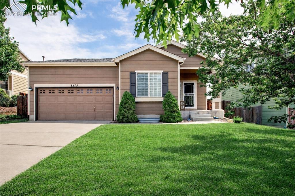 WELCOME HOME! From the moment you step inside, this stunning 5-bed, 3-bath home greets you with light-filled spaces, soaring vaulted ceilings, and a layout that balances comfort & functionality. With nearly 2,600 square feet of thoughtfully designed living space, there’s room for everyone to spread out while still feeling connected. Nestled on a beautifully maintained lot in the desirable Ridgeview at Stetson Hills, you’re just minutes from schools, parks, dining, shopping, & all the conveniences of the Powers Corridor. The main level offers effortless flow, where engineered wood floors, fresh interior paint, and vaulted ceilings create a bright, airy feel throughout the great room ideal for everyday living & entertaining. The kitchen features white cabinetry, stainless steel appliances, a gas range, and generous prep space. Tucked away for privacy, the spacious primary suite is a true retreat with an oversized shower, dual sink vanity, & a large walk-in closet. Two additional bedrooms, a full bath, & a 2-car garage complete the main level. Downstairs, the finished basement expands your living space with a large rec area wired for surround sound—perfect for movie nights or game days. Brand new carpet adds warmth & a fresh, updated feel in the basement. The lower level also offers excellent flexibility for multi-generational living, guest space, or a private home office setup. Two additional bedrooms, a full bath, a large laundry room with washer/dryer, and two storage rooms add convenience & functionality. Enjoy the fully landscaped backyard with mature trees providing shade & privacy, a cozy fire pit, and a storage shed for outdoor gear. Major upgrades include a new A/C unit, new furnace, and professionally sealed ductwork by Aeroseal for year-round efficiency and peace of mind. This home checks every box—space, style, thoughtful updates, & an unbeatable location. Don’t miss your chance to make it yours & experience what it feels like to truly love where you live!