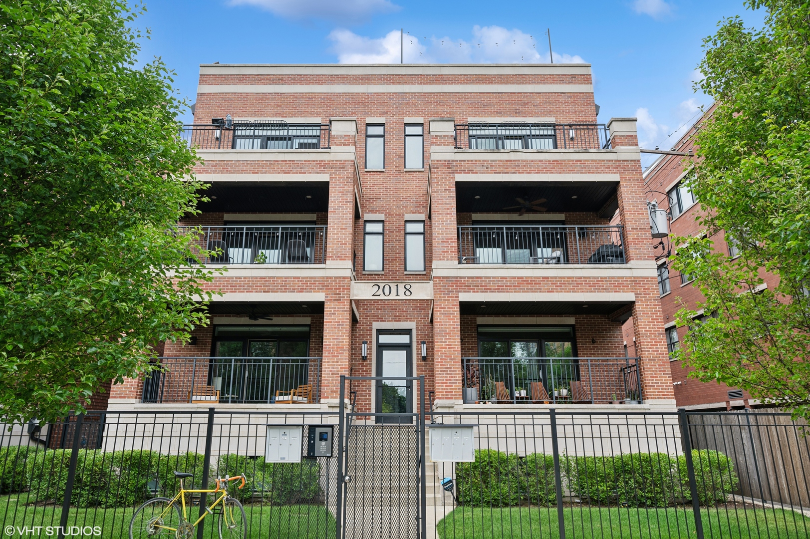 A meticulously maintained three bedroom, 2 bath condo located in the Heart of Wicker Park. Step inside and be instantly impressed by the high end elegant design. High ceilings throughout, an extra deep lot and neutral tones create a warm and inviting atmosphere.      A gourmet kitchen includes custom cabinetry with ample storage, sleek quartz countertops with a waterfall-edge island, and top-of-the-line Thermador appliances.     The spacious main living area soaks in natural light and centers around a beautiful fireplace. Oversized sliding doors open to a terrace complete with a ceiling fan and natural gas line. Grilling and hosting made easy.     The luxurious primary suite features a custom walk-in closet and gorgeous bathing room including heated floors, steam shower and separate soaking tub.     The unit also offers two additional bedrooms with built out closets, in unit washer dryer, great hallway closet space, high end remote window treatments in the kitchen/living space, garage parking and 6'x 8' additional storage space.    Move right in and enjoy all Wicker Park has to offer. Steps from renowned dining, shopping, nightlife and a weekly Farmer's Market (seasonal). Easy access to public transportation.