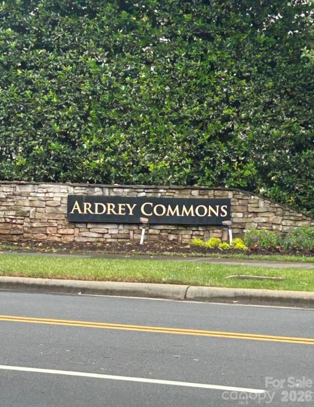 Beautiful Ardrey Commons TownhomeThis highly desirable Ardrey Commons Townhome welcomes you with a charming covered front porch. Inside, the main level features a spacious primary suite offering comfort and privacy, complete with two walk-in closets and an elegant bathroom showcasing a dual vanity, soaking garden tub, frameless glass shower, and a private toilet area.The main floor boasts an open-concept layout connecting the kitchen, breakfast and family room, highlighted by 10-foot ceilings, a cozy fireplace, and floor-to-ceiling cabinetry in the kitchen. The kitchen island includes a built-in wine fridge and stylish pendant lighting, making it a perfect space for any home chef. A walk-in pantry conveniently houses the washer and dryer as well and a half bathroom is located just off the kitchen area. The large formal dining room offers plenty of space for entertaining, while a separate breakfast area allows for casual, everyday dining.Hardwood floors complete most of the main level of the house. the master bedroom has carpet while the bathroom suite has ceramic tile.From the kitchen, step out to a private stamped-concrete patio featuring a remote-controlled awning and gas grill, ideal for outdoor relaxation or gatherings. It's a perfect place for you to enjoy quiet mornings with a cup of java or tea with complete privacy!Upstairs, you'll find three bedrooms, including a second potential primary suite, plus two additional versatile rooms—perfect for guests, family, or a home office. A second full bathroom and a large storage room complete the upper level. Most of the upstairs has carpet.Outside, the community offers tree-lined streets, sidewalks, and street lighting, creating a picturesque and walkable neighborhood environment.