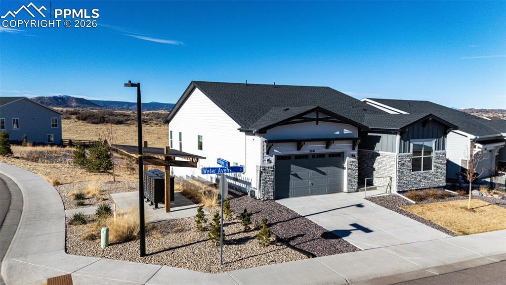 Welcome to modern ranch-style living in the desirable Montaine Regency neighborhood of Castle Rock in a vibrant Plus 55, active living development. This stunning single-level home offers an open and thoughtfully designed floor plan with 3 bedrooms, 2 baths, and approximately 1,914 sq ft of elegant living space.Step inside to a light-filled great room anchored by a chef’s show-stopping kitchen complete with a large center island, granite countertops, high-end appliances, and an extended dining area — ideal for everyday living and entertaining. The living area flows seamlessly to a covered deck where you’ll enjoy spectacular views of open space and foothills.The luxurious primary suite features dual walk-in closets and a spa-inspired ensuite bath. A convenient mudroom and dedicated laundry room enhance everyday functionality. Downstairs, the expansive unfinished walkout basement presents endless opportunities for customization.