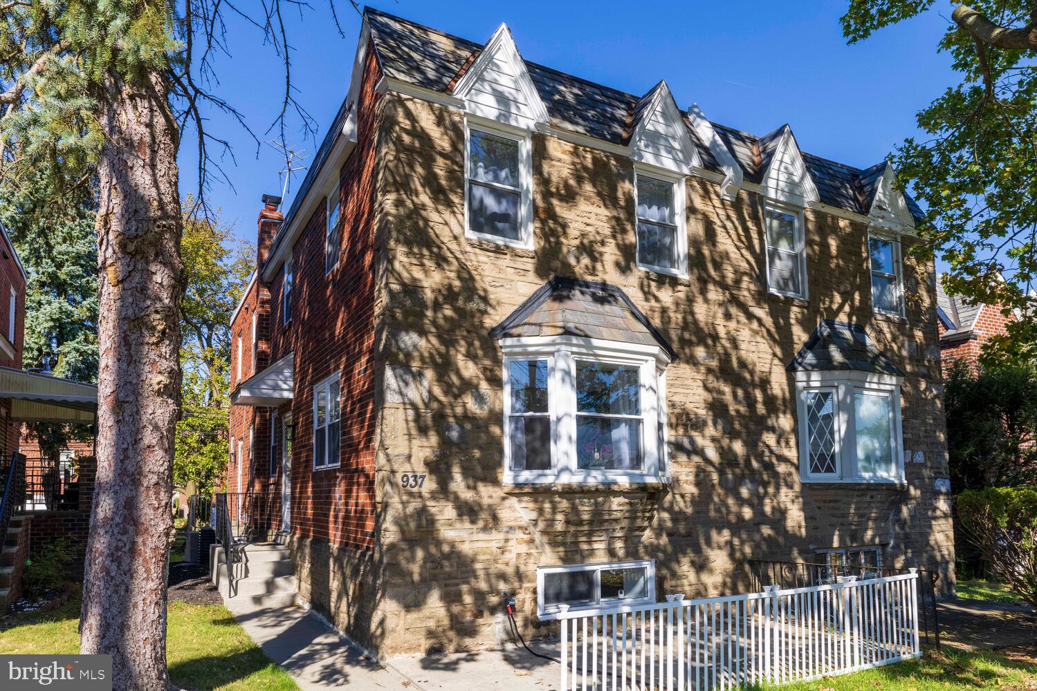 *ATTENTION BUYERS- Seller will pay up to $3000 towards your closing costs with acceptable offer by 04/01/2026This beautifully reimagined 3-bedroom, 3.5-bath stone and brick twin blends classic Philadelphia charm with modern comfort. Step inside to a bright, open-concept living area designed for both relaxation and entertaining, featuring a sleek accent wall, built-in electric fireplace, and TV mount for cozy nights in.The brand-new white kitchen is the heart of the home — complete with a center island, granite countertops, stainless steel appliances, and a spacious dining area that makes gatherings effortless. A full walk-in pantry adds the kind of storage every homeowner loves.Upstairs, unwind in your peaceful primary suite with a fully updated ensuite bath, showcasing a frameless glass shower and elegant tile work. Two additional bedrooms and a stylish hall bath complete the second floor, offering plenty of flexibility for family, guests, or home office space.The fully finished lower level adds even more versatility with its private entrance, full bath, kitchenette, and fireplace feature wall — ideal for a guest suite or in-law quarters.With modern updates throughout and a location close to shops, parks, and public transit, this move-in-ready home delivers the perfect mix of sophistication and everyday ease.