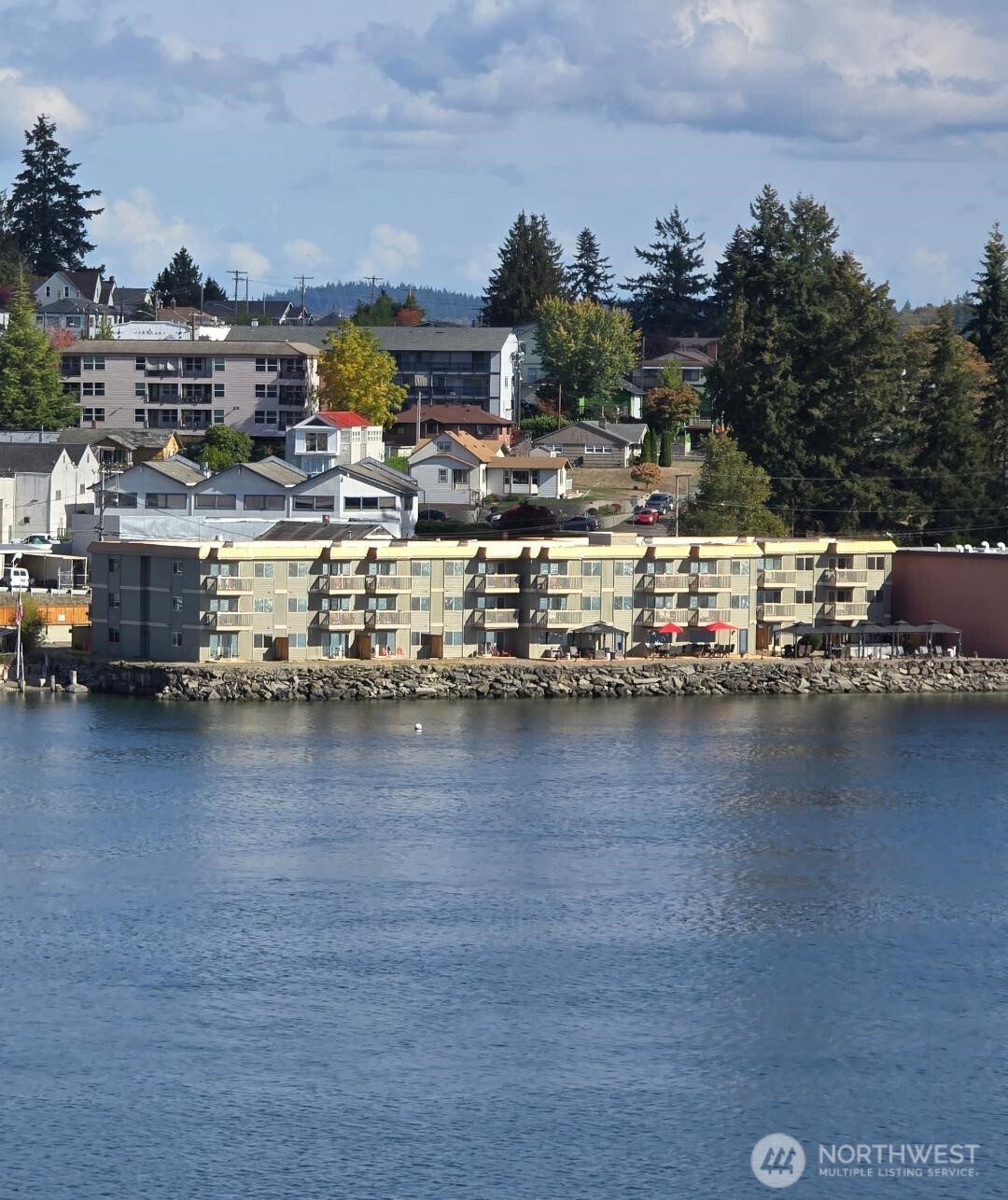 WATERFRONT ALERT!! Not only is this 50 unit apartment building located on 200 ft of waterfront across from the Seattle Ferry & PSNS but it has an elevator, new roof & UV windows and is furnished. That's right, every apartment is fully furnished for our corporate housing clients. This unique business model allows each of the 1 bed, 1 bath apartments to collect $3,300 a month with 3 units having been upgraded getting $4,500 a month. The building is mere feet away from the water with over 2000 sq ft of patio, 6 gazebos covering the outdoor kitchen with 2 bbqs, 14 ft bar, firepit & more. There is a small gym, 28 cameras,  & the rec room has a full kitchen, several seating areas, 70" TV, office & business center. ONCE IN A LIFE TIME PROPERTY!