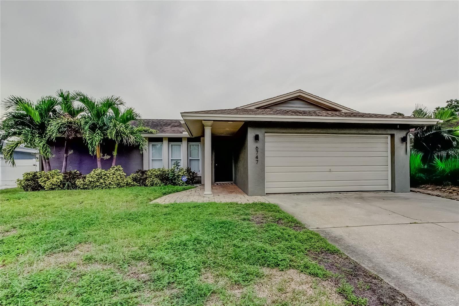 Bring your vision and finishing touches to this 3-bedroom, 2-bath, 2-car garage home tucked away on a quiet cul-de-sac. The current owners began a remodel with big-ticket updates already underway, but the project is unfinished — giving the next buyer a perfect opportunity. The kitchen is ready for your dream design, and an additional den/small bedroom has drywall installed, awaiting texture and paint. An open floor plan with a wood-burning fireplace in the great room, nicely sized original bedrooms, and a primary suite with walk-in closet and en suite bath set the stage. With an oversized garage, fenced yard, and newer windows and sliders, this home has great bones and character — ideal for a buyer ready to add sweat equity and make it their own.