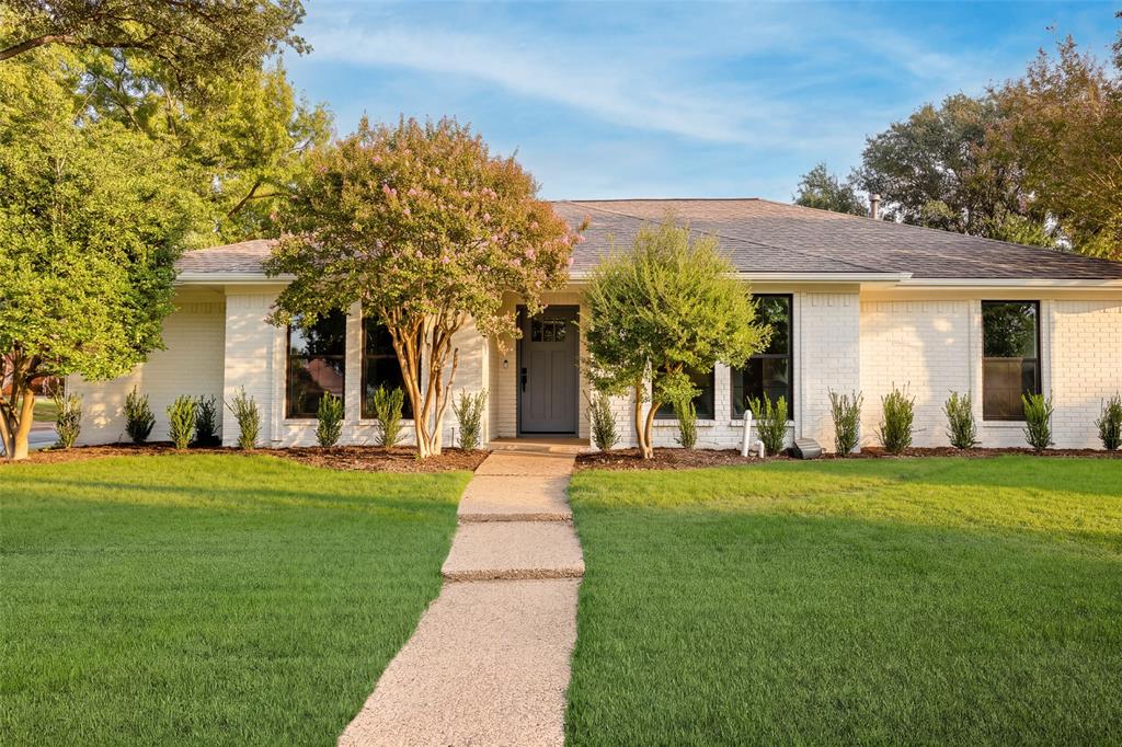 Welcome to 2416 Ables Drive, a beautifully updated home thoughtfully reimagined by Maverick Design, where timeless charm meets modern sophistication. Nestled in an established Plano neighborhood, this stunning property showcases exceptional curb appeal with freshly painted brick exterior, mature trees, and beautifully refreshed landscaping. Step inside to discover a bright, inviting interior featuring warm wood flooring, fresh neutral tones, designer lighting, and carefully curated finishes throughout. The spacious living area is highlighted by soaring vaulted ceilings with striking exposed beams, a beautifully updated brick fireplace, and an open layout that flows effortlessly into the kitchen. The kitchen features sleek quartz countertops, warm wood cabinetry, stainless steel appliances, a gas range, and a generous island perfect for everyday living and entertaining. Additional cabinetry provides abundant storage and functionality. The beautifully redesigned bathrooms showcase stylish tile selections, elegant vanities, modern fixtures, and designer accents, including a spacious primary bath with dual sinks and a stunning glass-enclosed shower. Step outside to your own private backyard retreat, complete with a sparkling freeform swimming pool, elevated spa, expansive decking, and freshly landscaped surroundings, creating the perfect setting for relaxing or entertaining. Blending thoughtful design, modern comfort, and inviting indoor-outdoor living, this exceptional Maverick Design home is ready to impress!
