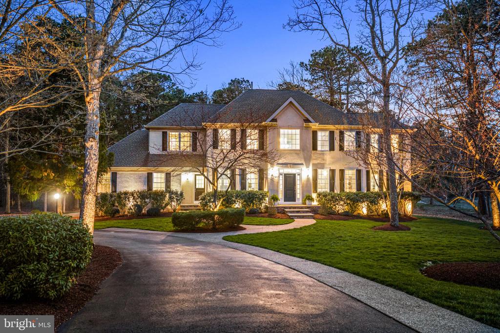 Set on a private, wooded lot in one of Medfords most established neighborhoods, 15 Somerton Square delivers the rare combination of timeless architecture and thoughtful, high-quality updates. A classic center hall design welcomes you with a bright, two-story foyer and a layout that balances everyday functionality with effortless entertaining. Formal living and dining spaces are complemented by a sun-filled family room with fireplace, while the updated kitchen (2021) anchors the home with crisp cabinetry, modern finishes, and seamless flow to the rear deck. Upstairs, the primary suite offers a quiet retreat with a spacious bath and generous closet space, while additional bedrooms are well-proportioned and filled with natural light. Where this home truly separates itself is in the capital improvements, often overlooked, but critical for long-term value. A new roof (2023), HVAC system (2019), and a fully reimagined outdoor living experience (2022) featuring a custom deck, patio, and fireplace create both peace of mind and a lifestyle upgrade. The backyard is private and serene, surrounded by mature trees, and designed for both quiet mornings and evening gatherings. A rare opportunity to own a move-in ready home in Medford where the major systems, design, and outdoor living have already been elevated.