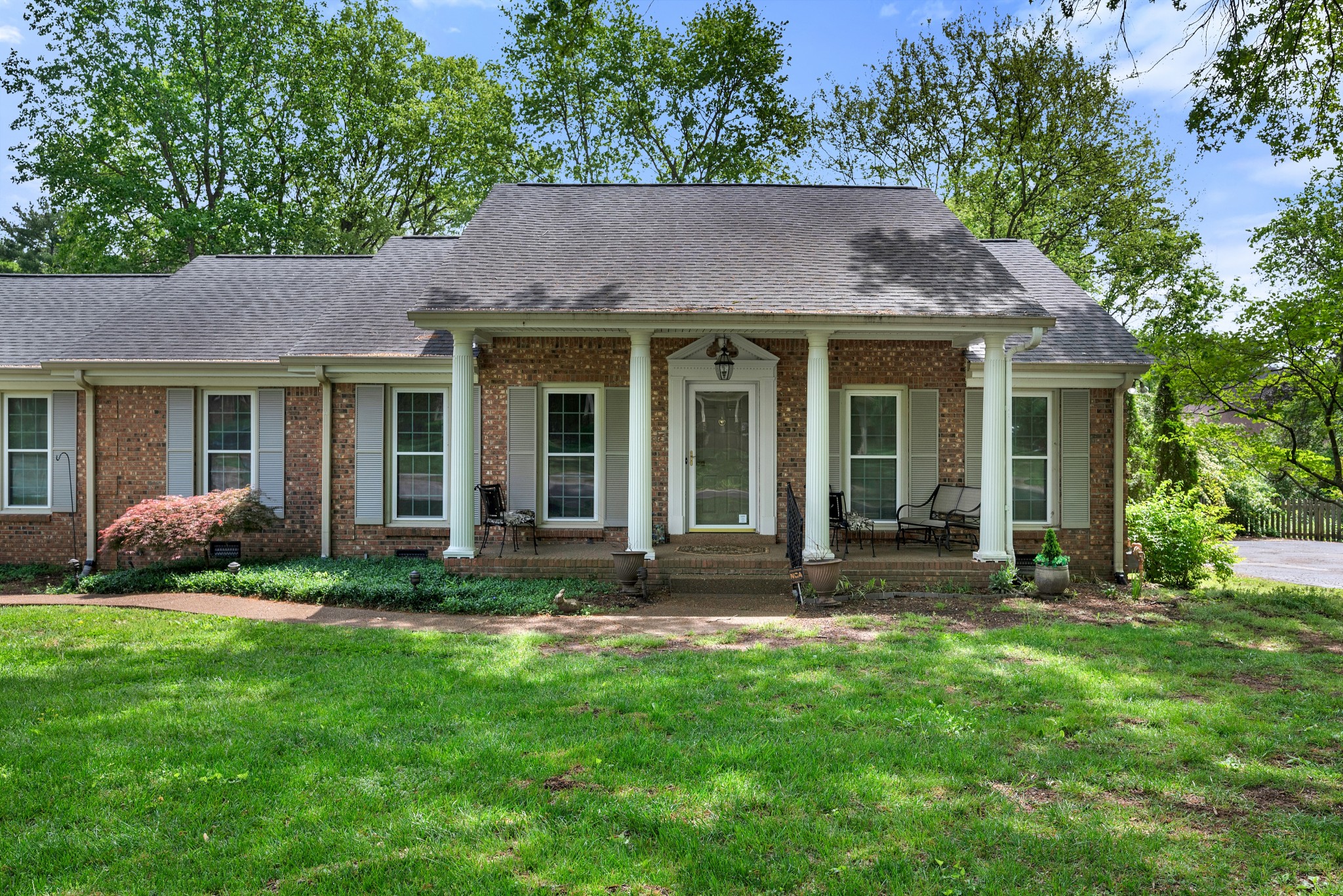 Welcome to your new retreat at 5544 Trousdale Drive in the heart of Brentwood, TN! This charming home offers 3 spacious bedrooms and 2 pristine bathrooms, perfectly designed for comfort and relaxation. With 2,168 square feet of living space, there's plenty of room to spread out and enjoy. The open floor plan seamlessly connects the living room, dining area, den and kitchen, making it perfect for entertaining on cozy nights by the fireplace. Sunroom is heated & cooled plus boasts sliding glass, screened  windows allowing enjoyment of every season. HVAC 7 Yrs. old. Roof less than 5 Yrs. old. Step outside onto your generous .39 acre lot, offering endless possibilities for gardening, play, or simply soaking up the sun. Various perennials are planted thru out back yard which backs up to a private wooded area. Home has been meticulously maintained and is waiting for your updates!  This property is a true haven, ready for you to make it your own. Don't miss out on this slice of Brentwood bliss!