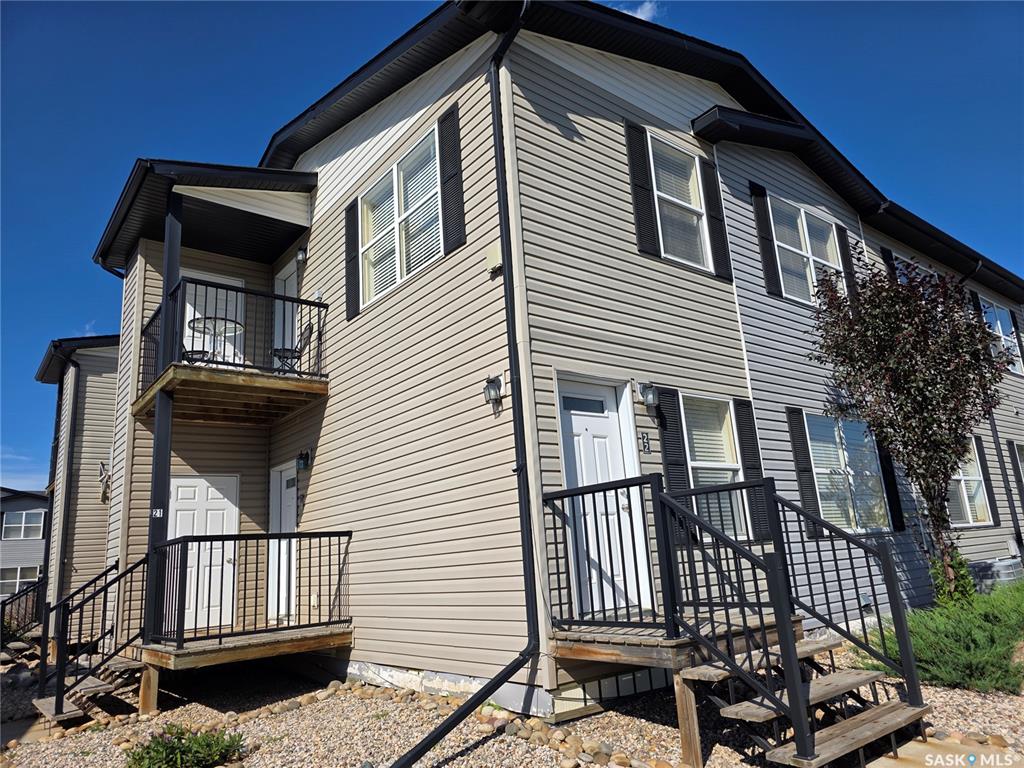 What sounds better, shoveling snow or going for a skate? Mowing grass or golfing? Raking the lawn or catching a fish? Check out this upper-level Chelsea Green condo that allows you to combine the freedom of homeownership with the freedom to do the things you really want to do. This 2016-built 1,116 sq.ft. 2-bedroom, 2-bathroom home has a great, open concept design, convenient in-unit laundry, high-efficiency furnace, and central air conditioning so you are never at the whim of someone else’s temperature setting. The luxurious master bedroom features a walk-in closet and 5-piece bathroom, complete with dual vanities as well as a walk-in closet. The second bedroom would be perfect for a guest room, a home office, or TV room. It comes with 6 appliances, a balcony with a view, an attached storage unit, a powered parking stall, and guest parking. Condo fees are just $300/month and include exterior maintenance, snow removal, yard care, and more. Chelsea Green offers convenience with its proximity to Riverside Park, walking paths, fairgrounds, and Swift Current Creek. Situated just a stone's throw away from a main thoroughfare, this 2016-built gem is a hop onto a main road that can quickly take you where you need to go -- work, shop or play. Book your showing of this move-in-ready condo!