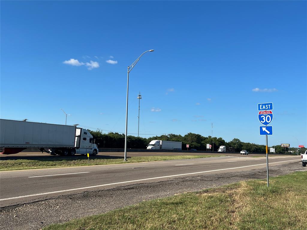 Exceptional location with I-30 frontage and cross road College St. which leads out to the Matrix Data Center Campus.  
Level and cleared corner lot with easy on and off access to I-30.  Zoned Heavy Commercial.
AADT I-30 is 35,342