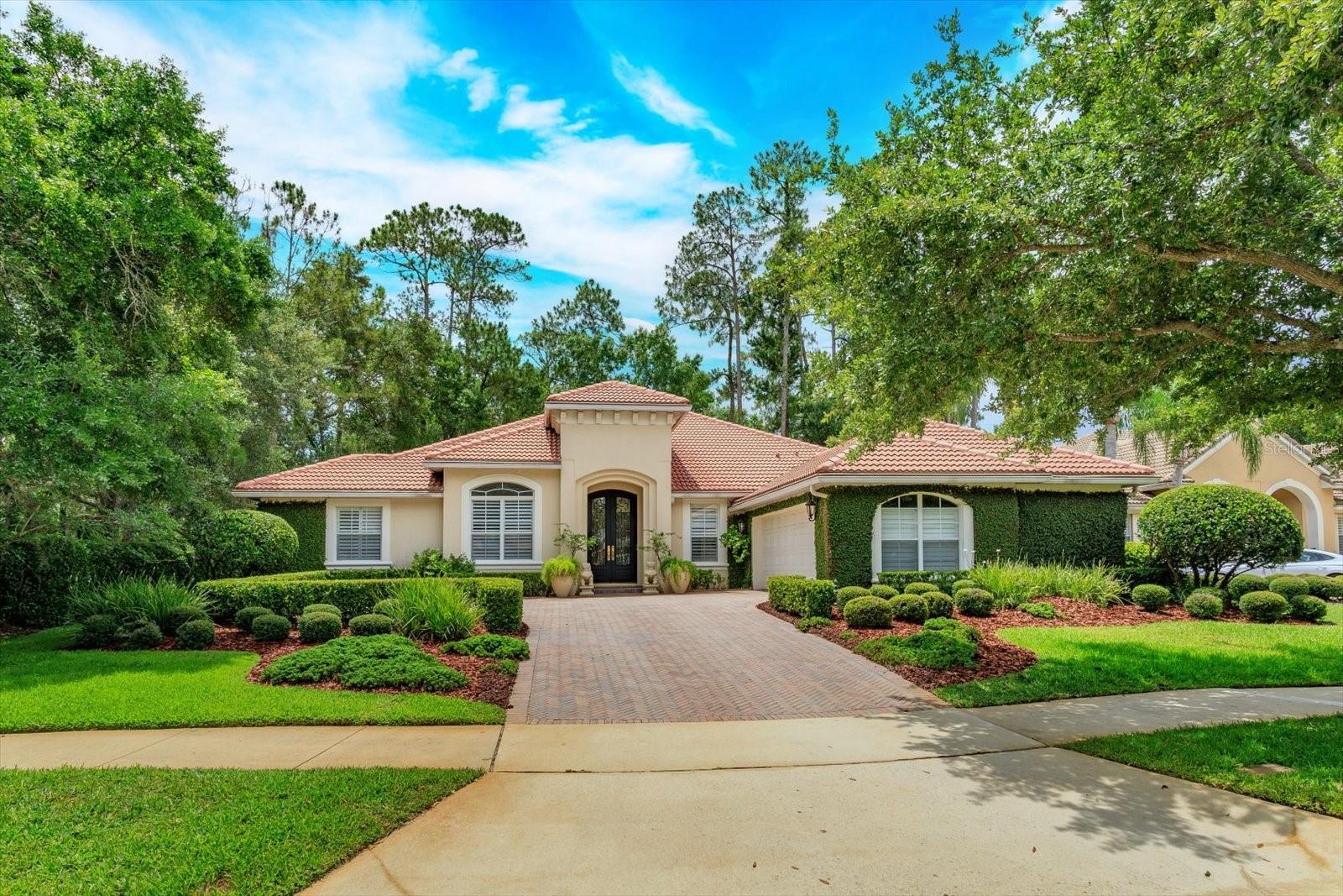Timeless Elegance Meets Modern Luxury in the sought after guard gated community of Alaqua Lakes.Step through custom iron entry doors into a light-filled, upscale home where elegance is evident in every detail. Luxurious travertine marble flooring graces the main living areas, complemented by rich Brazilian rosewood floors in the office and two bedrooms—completely carpet-free for a clean, upscale finish.
The chef-inspired kitchen is a standout, featuring a professional-grade French La Cornue gas range with double ovens (one gas, one electric), a custom limestone hood, Sub-Zero refrigerators, and striking limestone countertops. Whether you're hosting a dinner party or simply boiling water, this kitchen impresses.Retreat to the expansive primary suite with a spa-like bath that includes a freestanding porcelain tub, top-tier designer fixtures, and a shower with integrated jets for the ultimate in relaxation.French doors in the living room open to a screened-in backyard oasis, finished with travertine pavers—perfect for outdoor living and entertaining.Additional features include:- Wood plantation shutters throughout most of the home  - Energy-efficient double-pane windows  - Newer top-of-the-line Trane HVAC systems   Newer Rinnai tankless gas water heater - Whole-house natural gas powered backup generator  - Lightning protection system on the roof
- Water filtration system.Residents of this prestigious community enjoy world-class amenities including a resort-style community pool, tennis courts, a 7-acre park, open-air pavilion, and a multi-purpose sports field.
"""