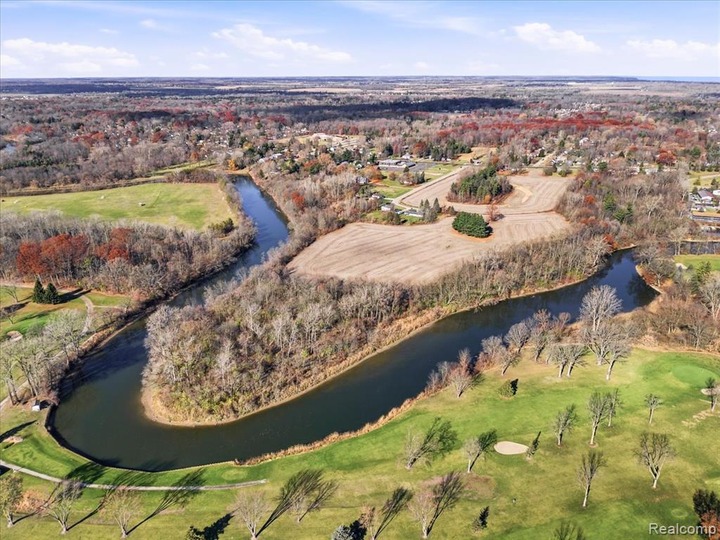 A developer’s dream on 63+ acres with 3,700 feet Black River frontage! 63+ acres across 14 parcels with an incredible 3,700 feet of Black River frontage in highly sought-after Fort Gratiot. This expansive property presents a rare opportunity for a visionary developer or investor. Multiple zoning classifications, including residential and multi-family, create a wide range of potential uses, from a riverfront residential community to a mixed-density development. The setting showcases exceptional natural beauty with wooded areas, open land, and panoramic water views. Located near major retail, schools, parks, and Lake Huron access, the site combines convenience with a sense of retreat. Few properties in St. Clair County compare in scale, location, and potential. An extraordinary chance to shape one of the area’s most impressive development sites. Site includes 8 homes currently rented for $68,000 annually, providing immediate cash flow while planning a larger project. Tax amounts in listing include all 14 parcels. Sale includes tax ID numbers: 74200322001000, 74200293006000, 74200293007000, 74200322002000, 74200322003000, 74200322004000, 74200900079000, 74200900079500, 74200900082000, 74200900083000, 74200900084000, 74200900085000, 74200900086000, 74205350002000.