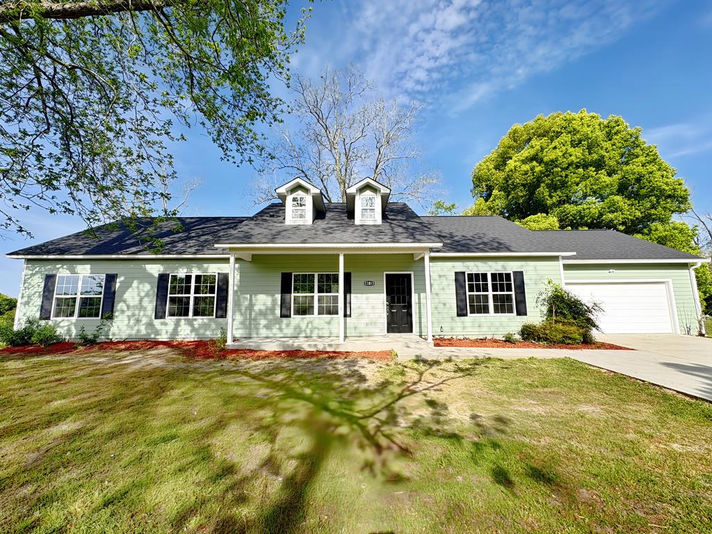 Beautifully remodeled 4-bedroom, 2-bath home featuring a spacious open floor plan perfect for modern living. The updated kitchen boasts white cabinetry, granite countertops, and stainless steel appliances, seamlessly flowing into the living area for easy entertaining. Enjoy generous natural light throughout the home along with thoughtfully updated finishes. Situated on a large lot, this property also includes a 2-car garage, offering plenty of space for parking and storage. Move-in ready and designed for comfort and style!