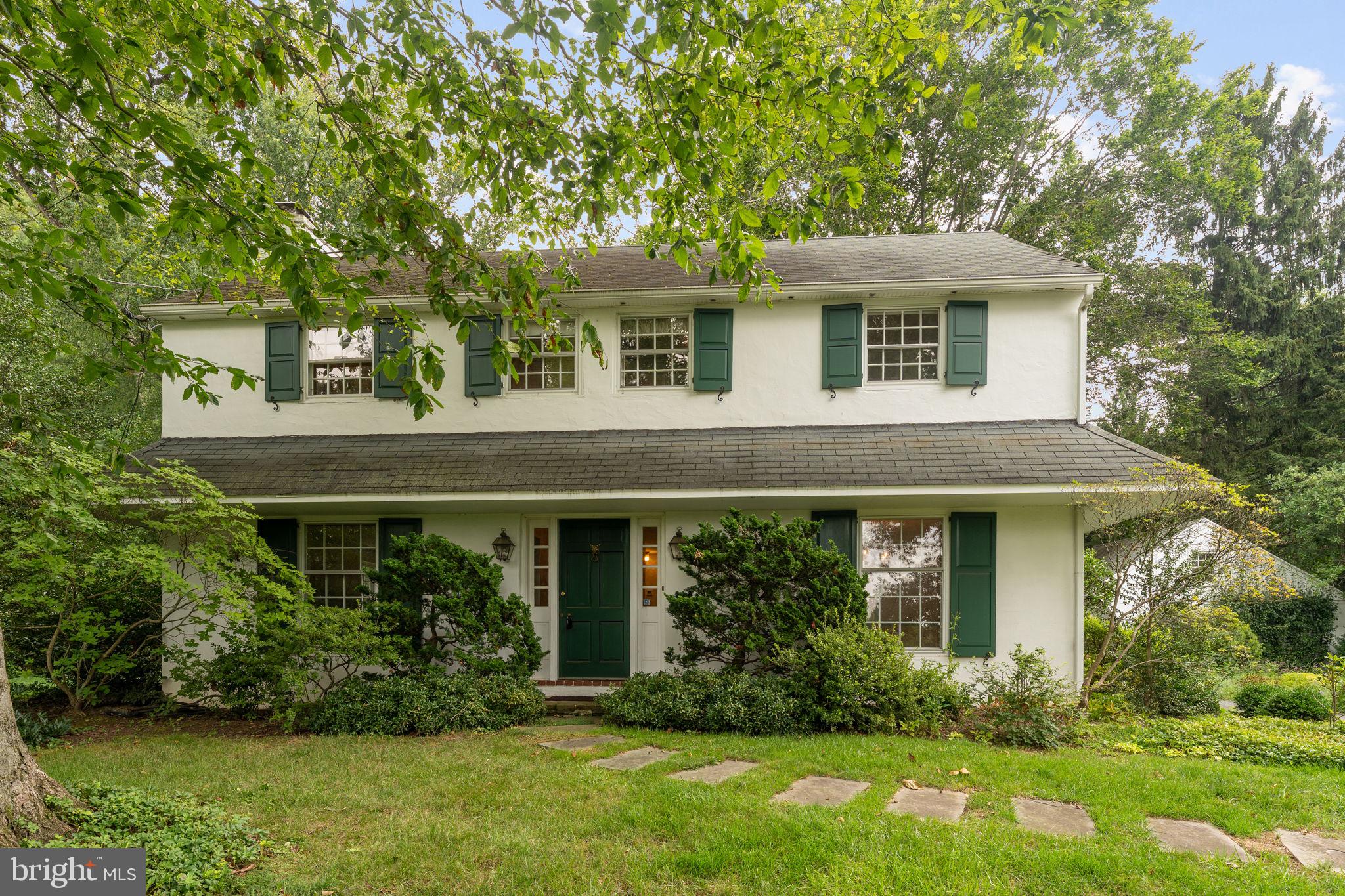 Welcome to 1531 Waynesborough Road, a classic Walter Off-built Colonial set on a beautifully landscaped one-acre lot in the highly sought-after Tredyffrin Easttown School District. Offered for the first time in 34 years, this well-loved and meticulously maintained home pairs quality construction and a timeless floor plan with beautiful hardwood floors, generous living spaces, and an established garden setting—all ready for its next owner to make their own. Step inside to find hardwood floors extending throughout the entire home. To the left, the formal living room is centered around a fireplace and features oversized windows along with direct access to the rear patio, creating an easy connection to the surrounding gardens. To the right, the formal dining room flows into a convenient pantry area offering abundant storage and a built-in workspace along with a side entry from the driveway. Continue through to the eat-in kitchen with stainless steel appliances. A cozy den with built-ins provides a comfortable additional gathering space, while a powder room completes the main level. Upstairs, the spacious primary bedroom features a large closet and en suite bathroom with a step-in shower. Three additional well-sized bedrooms share the full hall bathroom with tub/shower. The fourth bedroom offers direct access to the roof deck, while pull-down stairs lead to a floored attic providing plenty of additional storage. The unfinished lower level offers even more possibilities. Long used as a woodworking shop, it provides substantial workspace and storage along with the laundry area and convenient walk-up access to the side yard through Bilco doors. Outside, the one-acre property is a standout in its own right. Mature plantings and thoughtfully tended gardens surround the home, complemented by a rear patio and garden shed ready for the next green thumb. A detached two-car garage offers walk-up access to a full second floor, providing exceptional additional storage and flexibility. Lovingly cared for by the same owners for more than three decades, 1531 Waynesborough Road offers the quality, space, setting, and location that stand the test of time—with the opportunity for its next owner to add their own style and begin the home’s next chapter.