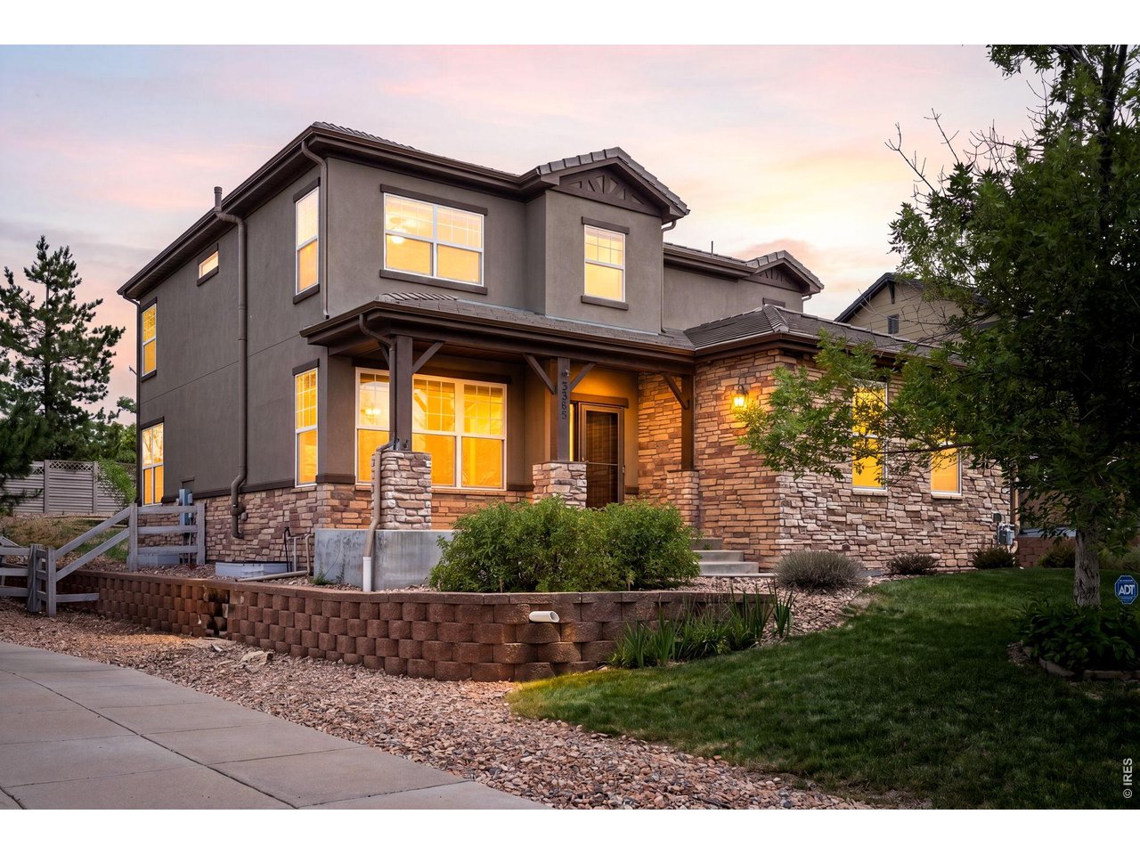 Beautifully maintained and thoughtfully updated, this spacious two-story home offers an exceptional combination of privacy, functionality, and flexible living space on a rare 9500 sqft lot. With no rear neighbors, the property enjoys a peaceful setting and a private backyard, all within walking distance of local schools, trails, parks and ponds. The main level features a bright and welcoming living room, a formal dining room for entertaining, and a dedicated office ideal for working from home. Fresh interior paint throughout gives the home a clean, move-in-ready feel. Upstairs, you'll find four generously sized bedrooms, including a spacious primary suite complete with a private ensuite bathroom. The well-designed layout provides room for everyone while maintaining a sense of comfort and privacy. The finished basement is truly a standout feature, offering a large recreation area with 7.1 surround sound equipment included with the sale for the perfect movie watching experience. There's also an additional bedroom, which is currently being used as a gym, and 3/4 bathroom. Even better, the basement furniture and gym equipment can remain with the home, creating a turnkey entertainment and fitness space for the next owner. Additional highlights include an attached three-car garage providing ample room for vehicles, storage, and hobbies. Residents enjoy access to the exceptional amenities of Anthem Highlands, including a community center, fitness facilities, swimming pool, parks, playgrounds, and miles of interconnected trails that make it easy to enjoy Colorado's outdoor lifestyle. With its desirable location, private backyard, versatile floor plan, and incredible basement amenities, this home is ready to accommodate a variety of lifestyles.