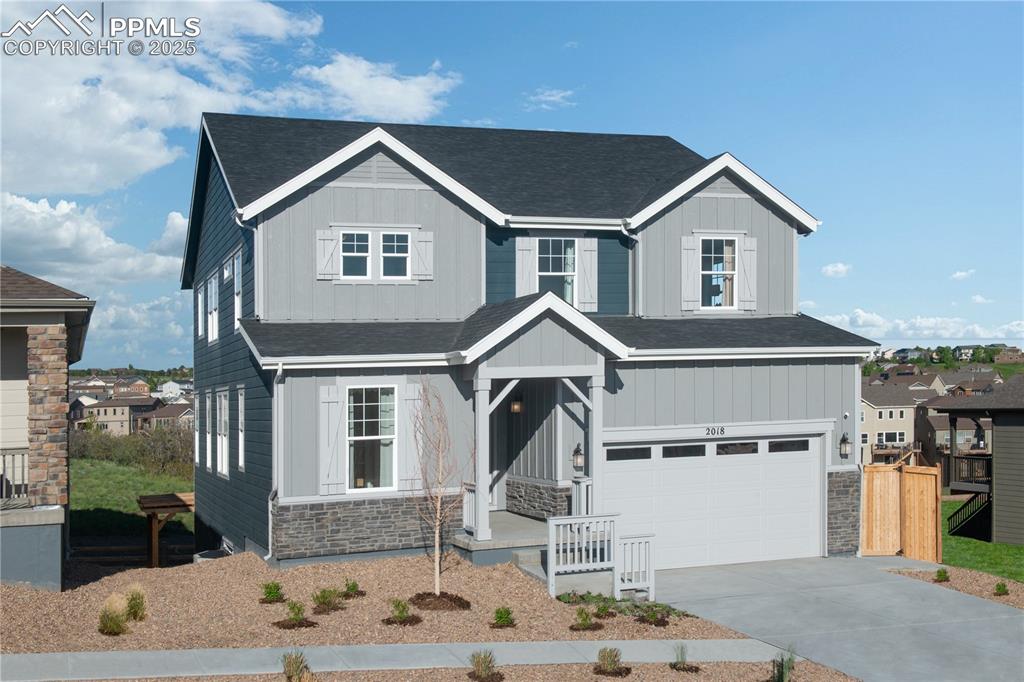 This two story home has everything you will love about Terrain Oak Valley in Castle Rock.
This is one of our model homes and has a ton of upgrades and beautifully finished. Inside, discover an open floor plan with 9ft ceilings. This spacious great room with an additional flex space for friends and family gatherings as you are able to walk directly out to the oversized covered deck which is an extension of living space. Cozy up to the traditional gas fireplace with floor to ceiling tile.  The stylish kitchen boasts of a large island, 42-in. Whole House Timberlake Sonoma Full Overlay Shaker Panel Stacked Cabinets and Ironstone Quartz counter tops. GE Profile gas stainless steel appliances include a frig and washer/dryer. The second floor primary suite showcases large walk-in closet, and a connecting spacious primary bathroom with 5 piece separate shower and tub. The large unfinshed walk-out basement with 9ft ceilings gives additional storage space and is roughed in for a future bathroom. The backyard is landscaped with additional patio and backs to open space. Welcome home as it is both nature and city, work and play, adventure, and leisure. Nature is right out your door. You can enjoy walking and hiking trails that wind through the entire community. If you just want to sit and relax, within walking distance is the Swim Club/pool. The Swim Club (Clubhouse ) is a warm gathering space, big screen TV, and fireplace. Terrain also offers the Dog Bone Park where you can unleash your 4-legged family members and let them run free. Also enjoy Wrangler Park with tennis courts, a picnic pavilion, playgrounds, and play fields. Centrally located on the plateau is Ravenwood Park with spectacular views, playground, and a long in-ground slide.