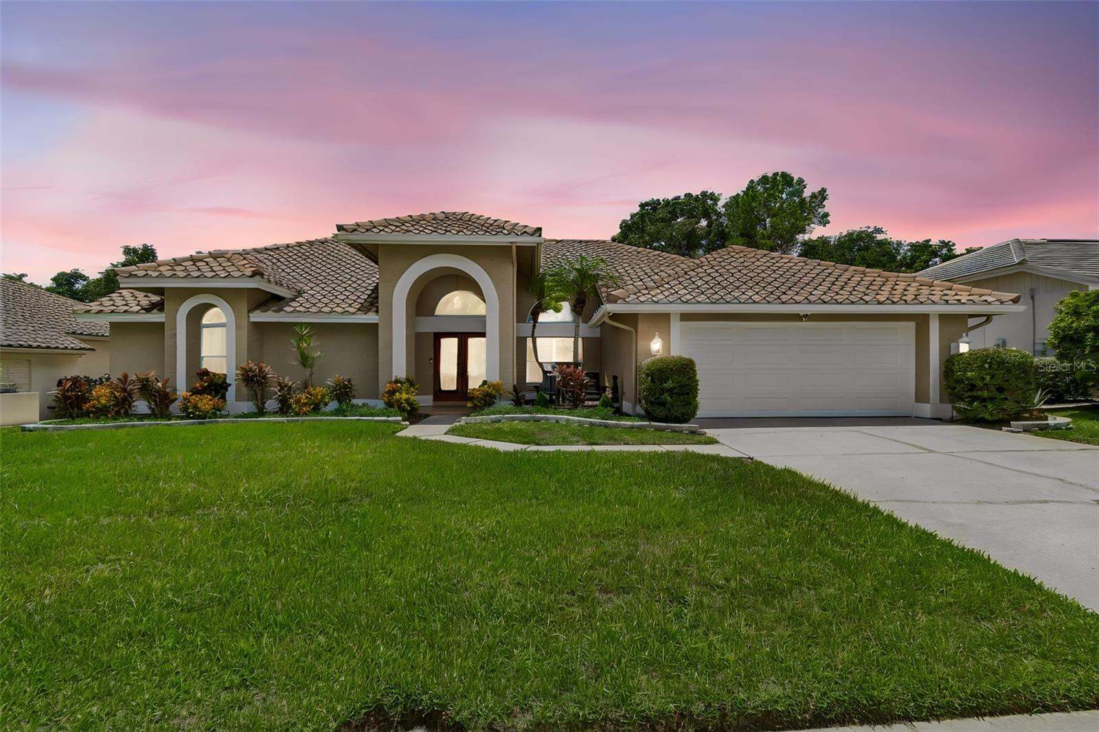 Exterior photo: Pool home backing to a nature preserve in Clearwater