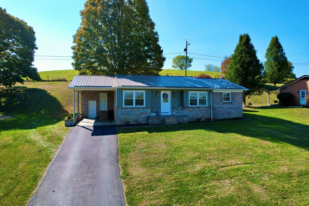 Discover your slice of small-town charm in this delightfully remodeled three-bedroom, one-bathroom home nestled in the heart of Chilhowie. This home showcases a beautiful kitchen with granite countertops that add both elegance and durability to the kitchen space, making meal preparation a genuine pleasure. Quality craftsmanship shines throughout this home. This property is a move-in-ready gem that perfectly balances comfort with style. The three bedrooms provide flexibility for family, guests, or home office space.  Outside, you'll appreciate the new outbuilding, perfect for storage, hobbies, or that workshop you've always wanted. The property sits in a welcoming neighborhood where friendly waves from neighbors are still commonplace and children can safely explore their surroundings.