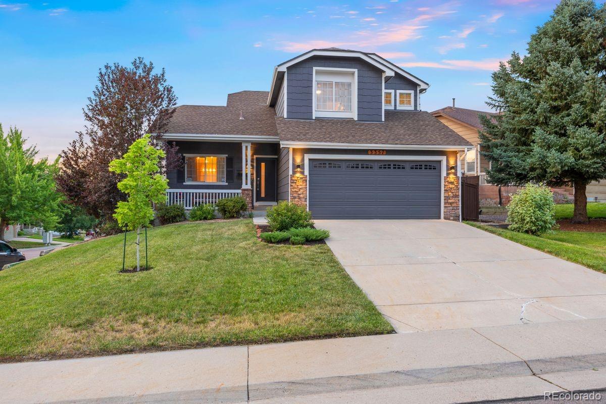 Tucked at the end of a quiet cul-de-sac on a spacious corner lot, this stunningly remodeled home offers both privacy and presence. Framed by mature trees, the front patio sets the tone for the detailed renovation inside. With a fully finished and light-filled basement, and an elevated location with scenic views, this desirable home offers walkability to parks, pools and schools in the charming Meadows neighborhood. 

Inside, the main level centers around a dynamic great room with 12-foot vaulted ceilings, large windows, a gorgeous on-trend accent wall with molding, and a statement chandelier. The main level flows seamlessly from the dining area to the stylish kitchen, where quartz waterfall counters meet a custom tile breakfast bar, and a porcelain farmhouse sink adds functionality and charm. Samsung appliances, a Bosch dishwasher, and soft-close cabinetry bring thoughtful design and convenience to an already beautiful space. The living area features a blue tile fireplace flanked by built-in benches and shiplap accents. A renovated mudroom leads to a powder room and a finished two-car garage with shelving, bike racks, and exterior access. 

Upstairs, the vaulted primary suite offers a picture window, walk-in closet with built-ins, and a refined ensuite with stone-topped dual sinks, a walk-in shower, and private water closet. Two additional bedrooms share a stylish full bath, while a fourth bedroom or office adds flexibility. Carpeted floors and mirrored closets enhance comfort and function. 

The fully finished basement includes a spacious recreation space, under-stair storage, an additional bedroom or office, a ¾ bath with walk-in shower, and a separate laundry room with a gorgeous accent wall. 

Step outside to a raised back deck with gas line for grilling, curated landscaping, and a cozy fire pit surrounded by twinkling lights. This fully fenced yard offers room to relax or play. This home has great flow, timeless style, and space to grow—inside and out.
