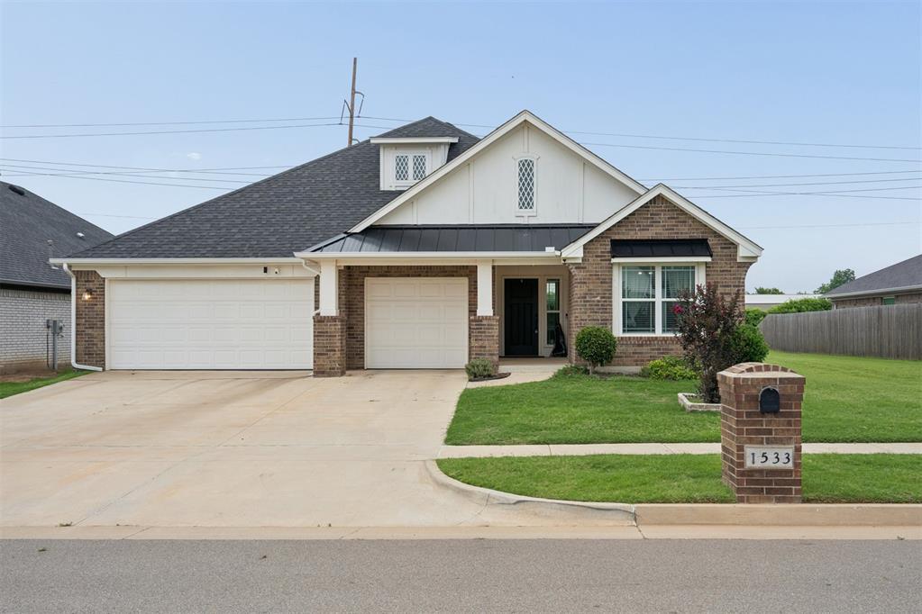Why wait to build when you can own a better-than-new home that already has the upgrades, appliances, and privacy your are searching for? Built in 2021 and meticulously maintained, this beautiful 3-bedroom, 2-bathroom home with a dedicated study offers the perfect combination of modern style and an exceptional location within the highly sought-after Moore School District. One of the standout features of this property is its premium homesite. The backyard backs directly to a greenbelt, providing peaceful views and no rear neighbors. In addition, extra greenspace beside the home creates even more separation and privacy, making this one of the most desirable lots in the neighborhood.  Inside, you will immediately appreciate the open-concept floorplan designed for both everyday living and entertaining. Rich wood flooring flows throughout the main living areas, creating warmth and durability while complementing the home's modern finishes. The spacious living room opens seamlessly to the kitchen and dining area, allowing everyone to stay connected. The kitchen is a true centerpiece featuring a gas cooktop, sleek modern vent hood, built-in wall oven, wall microwave, abundant cabinetry, and stylish black hardware that adds a contemporary touch. Even better, the refrigerator, washer, and dryer all remain with the home, making your move even easier. The dedicated study offers flexibility for those working from home, homeschooling, or simply needing a quiet space to focus. All bedrooms are equipped with ceiling fans for year-round comfort. The private primary suite serves as a relaxing retreat and features a spacious bathroom with a large walk-in shower designed without a ledge for easy accessibility and a clean, modern look. Additional features include a storm shelter conveniently located in the garage, offering peace of mind during Oklahoma weather. Modern, functional, and beautifully maintained, this is an opportunity you will not want to miss.