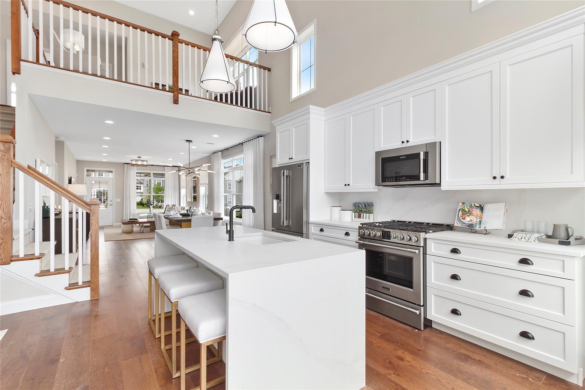 Welcome to 298 Silver Timber Drive at Country Pointe Meadows — a beautifully designed two-story home that perfectly blends style, space, and function.
This thoughtfully crafted residence features 2 spacious bedrooms, 2.5 baths, an open-concept loft, and a den on the second floor — offering the perfect mix of private retreat and flexible living space. The primary suite is located on the main level and includes spacious closets and a luxurious en-suite bath.
The second floor adds even more versatility to the home, featuring a generous guest bedroom, full bath, open loft area, and a private den—ideal for a home office, media room, or additional lounge space. Whether you’re hosting overnight visitors or working from home, this level offers the privacy and flexibility to fit your lifestyle.
Enjoy effortless entertaining with a bright and airy layout that includes a gourmet kitchen, expansive great room, and covered front entry. A private garage and outdoor patio provide added convenience and comfort.
Enjoy outstanding community amenities, including a clubhouse, snow removal, and a manned gatehouse. The community offers two heated pools with sundeck and cabanas, a fitness center, tennis, bocce, and pickleball courts, along with indoor and outdoor bars, barbecues, and firepits. Watch sports in the lounge or socialize in vibrant spaces. Moments away from world-class golf courses and county biking trails, plus the Boulevard’s retail center with shopping, dining, healthcare, and entertainment options. This is where your new life begins! Sale may be subject to term and conditions of an offering plan. Buy directly from the builder with a 1-year warranty included. Photos attached are of a similar home.