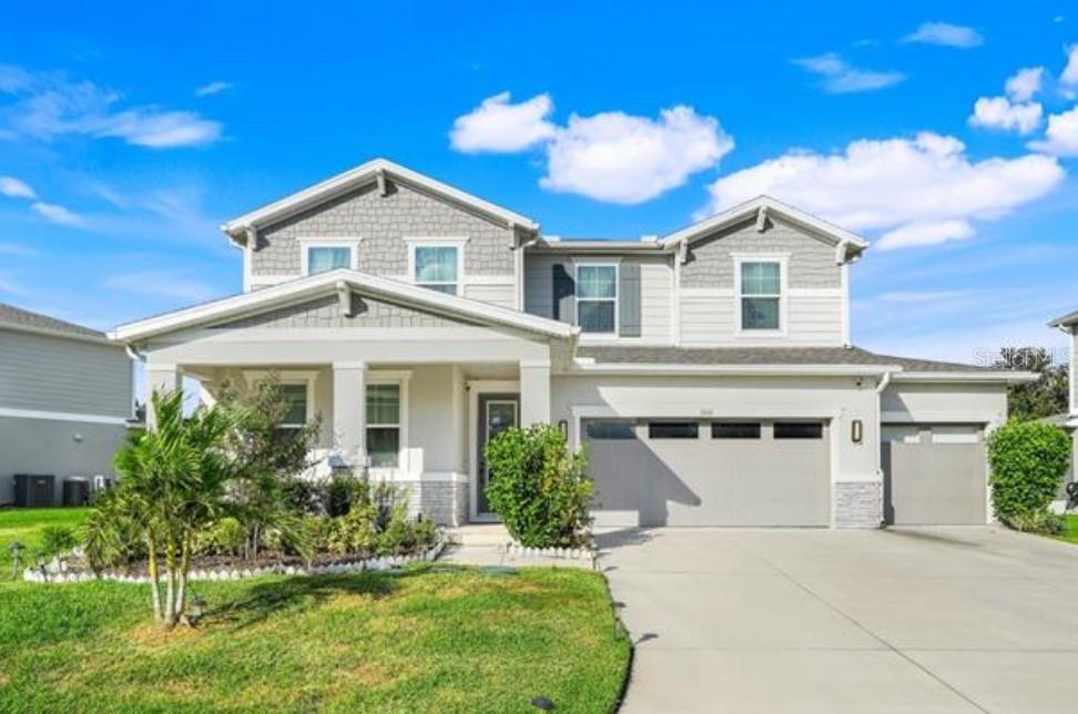 Welcome to this stunning 2023-built, 3,210 sq ft MULTI-GENERATIONAL home located in the highly sought-after Palisades community in Clermont. This thoughtfully designed home offers 4 BEDROOMS, 3.5 BATHROOMS, PLUS 2 BONUS ROOMS, and is perfectly positioned with front-facing POND and CONSERVATION views, a charming front porch, and a peaceful natural setting.Step inside to a bright, open floor plan filled with natural light and modern finishes throughout. The heart of the home is the GOURMET KITCHEN featuring quartz countertops, stainless steel appliances, 42" upper cabinets, a BUTLER’S PANTRY, and a large center island that opens seamlessly to the family and dining areas — ideal for everyday living and entertaining.The home includes a PRIVATE FIRST-FLOOR SUITE with a full bath, perfect for guests, extended family, or a home office. Upstairs, the spacious OWNER’S SUITE offers a spa-inspired bathroom and a large walk-in closet, along with two additional bedrooms (each with walk-in closets), a full bath, an OVERSIZED LOFT (ideal for a home office, gym, media room, flex space, or potential 5th bedroom), and a conveniently located laundry room.Enjoy outdoor living with a covered patio in the backyard — perfect for relaxing or entertaining — and take in serene pond and conservation views from the inviting front porch.Residents of Palisades enjoy RESORT-STYLE AMENITIES including a community pool, clubhouse, tennis, pickleball and basketball courts, lakefront playground, private boat ramp with access to Lake Minneola, golf cart trails, boating, fishing, and picnic areas. HOA dues include fiber-optic internet and basic cable.Conveniently located just minutes from Historic Downtown Clermont, AdventHealth, shopping, dining, and with easy access to the Florida Turnpike — and an easy drive to Orlando, theme parks, and Florida’s beautiful beaches.This home offers the perfect combination of space, flexibility, privacy, and lifestyle — truly a must-see!