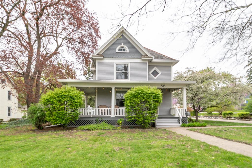 Modern convenience meets timeless charm in this beautifully maintained historic home, ideally located within walking distance to downtown Saline and just across from the city-owned Curtiss Mansion. From the inviting covered front porch, you'll enjoy a setting that blends classic character with a vibrant, walkable lifestyle.Inside, rich woodwork and thoughtful details highlight the home's historic appeal, complemented by a modern kitchen featuring granite countertops and tiled flooring. The spacious main floor offers a formal dining room, living room, parlor, bedroom, and full bath--perfect for both everyday living and entertaining.Upstairs, the primary suite is connected to a tastefully updated bathroom with granite and tile through a walk-in closet, while two additional bedrooms offer generous space rarely found in homes of this era. The basement is exceptionally clean and well-organized, providing flexible space for an office, laundry area, workshop, and storage.Step outside to a backyard that truly stands out, featuring an expansive additional parcel included in the sale--offering endless possibilities. Enjoy relaxing in the screened gazebo or entertaining on the awning-covered deck. The original carriage house remains functional, and the attached garden shed is ideal for cultivating beautiful outdoor spaces.This is a rare opportunity to own a distinctive historic home in a prime location--full of character, space, and walkable charm.