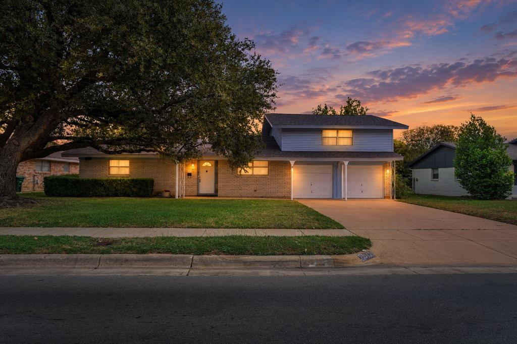 Welcome to this charming two-story brick home in the well-established and centrally located Wedgewood neighborhood. Offering a flexible floor plan with two bedrooms upstairs and a third bedroom downstairs, all featuring ceiling fans. Enjoy low-maintenance living with no carpet—tile and wood laminate flooring throughout. The breakfast room is filled with beautiful morning sunlight and features a large sliding glass door overlooking the spacious, fenced backyard. The inviting living area includes a wood-burning fireplace with a gas starter, perfect for cozy evenings. Step outside to enjoy the covered patio, mature oak tree in the front yard, and sprinkler system. A new roof was installed in Fall 2026. Conveniently located near shopping, dining, schools, and major roadways.