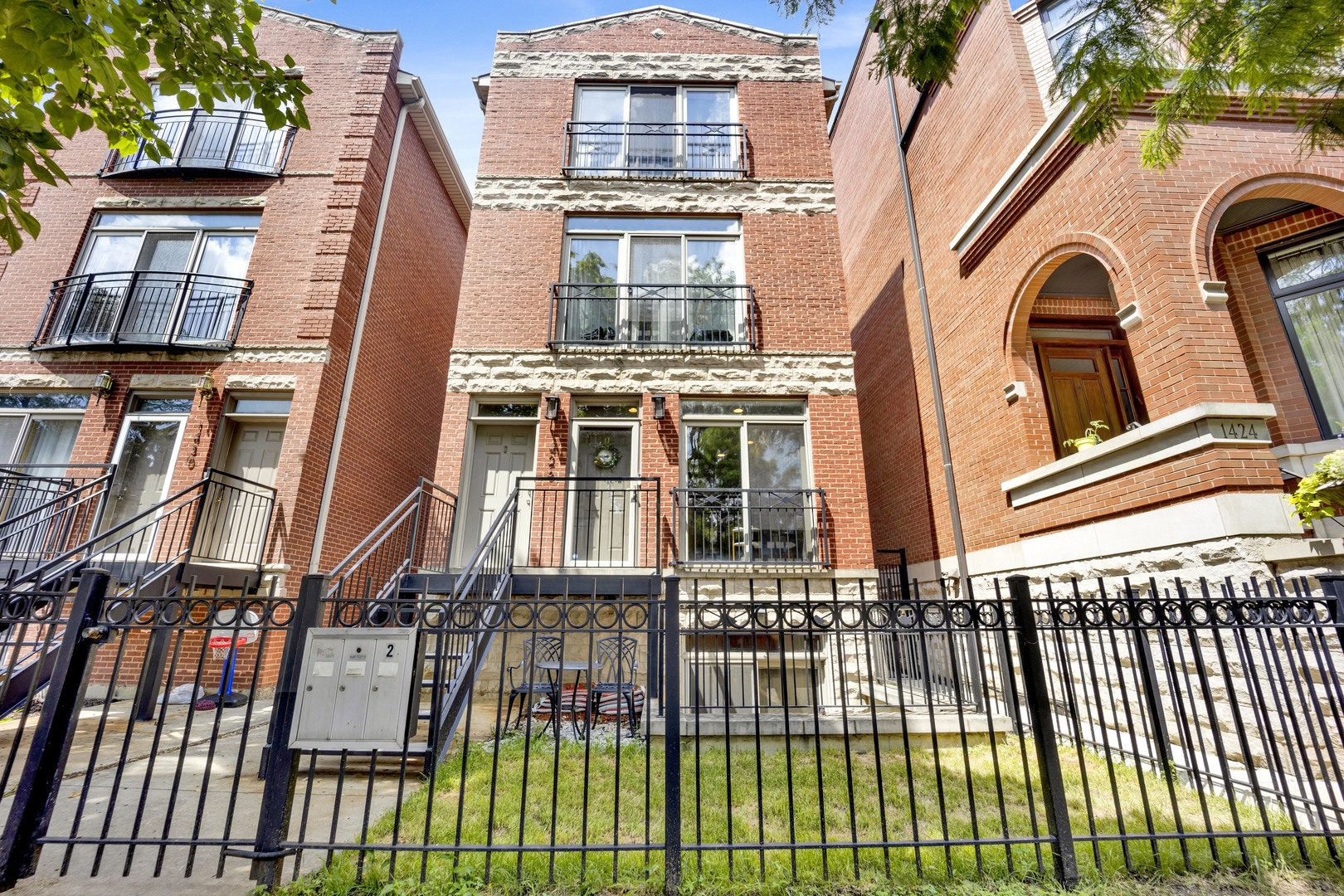 HUGE 3BD/2BA Duplex Down in Coveted Little Italy - Lives Like a Single Family Home! Welcome to this beautifully maintained 3-bedroom, 2-bathroom duplex down located on a picturesque, tree-lined street in highly sought-after Little Italy. Offering the space and comfort of a single-family home, this expansive unit boasts three outdoor areas, two fireplaces, and a thoughtful layout ideal for both entertaining and working from home.    The spacious primary suite features a luxurious marble bathroom and a large walk-in closet, while the additional bedrooms are generously sized. Enjoy the outdoors from your front patio, private rear deck, and shared rooftop deck over the garage - perfect for grilling, lounging, or enjoying city views. Thoughtfully maintained with key updates including: new front stairs (2025), new basement flooring (2024), new refrigerator (2023), new humidifier (2024), new industrial-strength ejector pump (2025), and newer HVAC (2021). Full cedar rooftop deck and stained rear deck (2022). Laundry room with extra storage and new washer (2022).Located just steps from West Loop's premier dining, Blue & Pink Line stations, and multiple parks, with easy access to 290 and 90/94. Families will love the Blue Ribbon schools and vibrant neighborhood feel - all while being minutes from the heart of downtown. This is a rare opportunity to enjoy the best of both worlds - West Loop convenience with Little Italy charm. Don't miss it! PLEASE NOTE: The ACTUAL address is 1426 W. LEXINGTON.