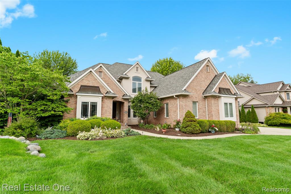 Some homes on the lake are beautiful.And then there are the rare ones where the moment you walk in, everyone stops…because the view simply takes over the room.With 101 feet of pristine frontage on Pine Lake, this custom-built residence was designed to capture what may be one of the most breathtaking vantage points on the lake. From the soaring great room with its dramatic wall of windows to the private primary suite retreat, the water feels like it’s always part of the home.Offering over 4,600 square feet of thoughtfully designed living space, this 4-bedroom, 4-bath home blends luxury with comfort. The gourmet kitchen features custom cherry cabinetry, wood flooring, a granite island perfect for gathering, and a tumbled stone backsplash, all anchored by a striking dual-facing fireplace that connects beautifully to the main living areas.The primary suite enjoys sweeping panoramic lake views, trey ceilings, and a beautifully appointed bath that feels like a private retreat.Downstairs, a newly remodeled finished lower level creates an ideal space for entertaining or extended gatherings, while the sunroom and expansive new Trex deck with glass-panel railings offer front-row seats to both sunrises and sunset reflections across the water.Recent updates include a full-house generator, new furnace and air conditioner, a new dock, and a fortified break-wall for long-term peace of mind.Pine Lake offers the kind of lake living people dream about — fishing at sunrise, afternoon swims, kayaking along quiet shoreline stretches, and relaxed pontoon evenings as the sun sets across the water.And while there are beautiful homes on many lakes…very few offer a view quite like this one.