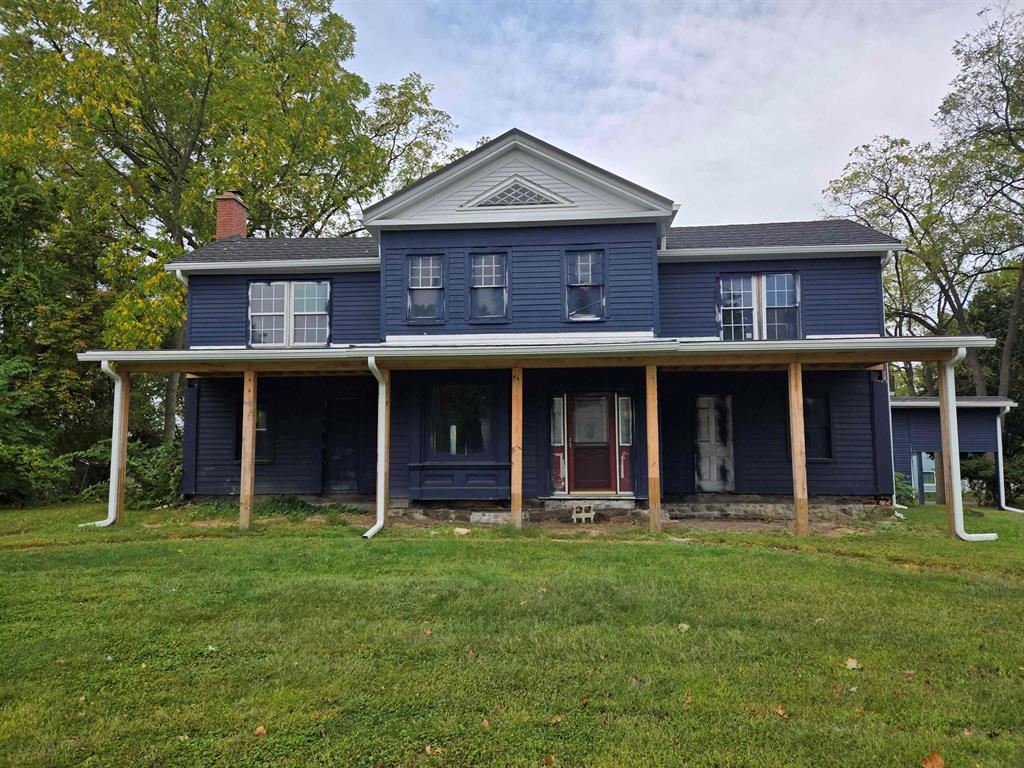 Endless possibilities meet timeless character on Main Street! Bursting with vintage charm and craftsmanship, this stately residence sits within walking distance of downtown and could shine as a gracious single-family home or an enchanting Bed & Breakfast (subject to approvals). The flexible layout features 6 bedrooms, plumbing on the second floor for a future second kitchen, and a private rear stairway with separate entrance, ideal for converting the upper level into an independent living area for potential rental income. Major investments are already done: a premium granulated metal shingle roof (~$75,000) is new, and brand-new windows for the entire house (~$80,000) have been ordered and are awaiting delivery. Inside, the home has been thoughtfully gutted and is ready for your finishes; Lopez Engineering has inspected the structure and foundation and confirmed they're solid, and the structure has city approval. A circle drive in back and a garage add convenience. Bring your imagination and make this landmark your masterpiece.