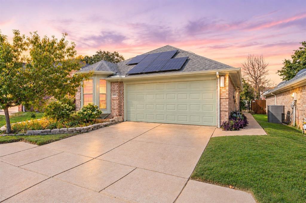 Welcome to this beautifully maintained 3-bedroom, 2-bath Bedford home, offering a rare blend of comfort, thoughtful updates, and peaceful living in the heart of the Dallas-Fort Worth Metroplex. Set in an established neighborhood with mature surroundings, the home features wood-look tile throughout, soaring ceilings, and a welcoming living room with a fireplace. The updated kitchen is appointed with quartzite countertops and KitchenAid stainless steel appliances, creating a stylish and functional space for everyday living and entertaining. Recent improvements provide added peace of mind, including a roof replaced in 2023, new HVAC in 2025, new insulation in 2026, and windows replaced in 2021. Paid-in-full solar panels are an added energy-conscious feature. Step outside to the flagstone patio and enjoy a peaceful setting overlooking a greenbelt and walking trails behind the home, offering a private backdrop for morning coffee, outdoor dining, or relaxing evenings. The HOA maintains the lawn area, helping simplify exterior upkeep and preserve the neighborhood’s appearance. The sellers have especially loved the quiet setting, friendly neighbors, and easy access to healthcare, shopping, dining, and community amenities. Conveniently located near major highways and DFW International Airport, this home makes commuting, travel, and exploring the Metroplex easy. Enjoy convenient access to Bedford, Hurst, Euless, Grapevine, Fort Worth, and surrounding areas. With its inviting interior, significant recent updates, and tranquil outdoor setting, this home offers a wonderful opportunity to enjoy comfortable living in a convenient Mid-Cities location. Whether you're hosting guests in the open living spaces, preparing meals in the updated kitchen, or enjoying the natural setting from the patio, this home combines practical features with a peaceful atmosphere and an appealing location. SEE IT TODAY OR SEE IT SOLD!!