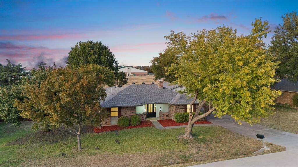 Welcome to this beautifully renovated 3 Bed, 2 bath home with 1,571 square feet, situated on over a third of an acre, with an added detached, oversized two-car garage. Located in Prosper ISD with an A rating from the Texas Education Agency. Upon stepping inside, you will discover a complete transformation. The home features a NEW roof with a limited lifetime warranty, and foundation work backed by a lifetime transferable warranty. Every system has been carefully addressed, from pressure-tested water lines to an improved drainage system where the old cast iron was professionally bypassed. All ductwork has been completely replaced. SolidTech Essentials vinyl plank flooring flows seamlessly through living areas, while marble graces the primary bathroom floors. Custom cabinetry adds both storage and style, complemented by stunning quartz countertops in the kitchen and custom marble countertops in both bathrooms. The kitchen's marble backsplash provides an elegant finishing touch that ties the space together perfectly. Fresh texture, paint, and trim create a crisp, modern atmosphere, while select new sheetrock ensures everything feels brand new. An upgraded electrical panel easily handles today's power needs. Parvin Park sits blocks away. Daily conveniences are easily accessible with a Target nearby and downtown Prosper, featuring Blackhawk Brewery, 1418 Coffee, The Rustic Warehouse for furniture and home decor, Lily Claire clothing boutique, and The Gin, all within walking distance or a short golf cart ride away. Every major system has been addressed, every surface refreshed, and every detail considered. The result is move-in-ready comfort with the peace of mind that comes from knowing everything has been done right. Whether you're starting out, scaling up, or simplifying, this thoughtfully renovated home offers the perfect blend of modern updates, quality craftsmanship, and a convenient location that makes daily life just a little bit easier.