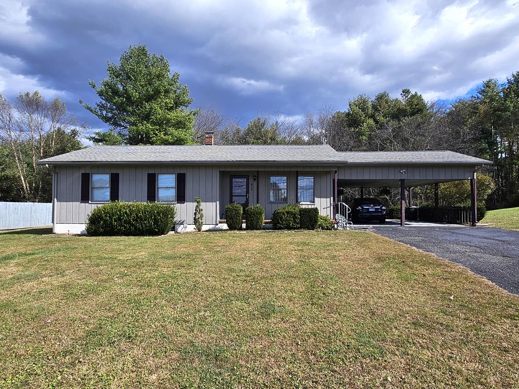 Enjoy comfortable one-level living in this charming 3-bedroom, 1.5-bath home located in the City of Galax. Situated on a beautiful lot with lovely views, this property offers convenience and comfort with easy access and a paved driveway. Features include a spacious two-car carport, a handy outbuilding for storage or hobbies, and a full unfinished basement ready for your personal touch. Perfectly located just minutes from the New River Trail, Galax City Schools, shopping, and medical facilities, this home combines a peaceful setting with the benefits of in-town living. Don't miss this great opportunity in a desirable Galax location! Call Today!