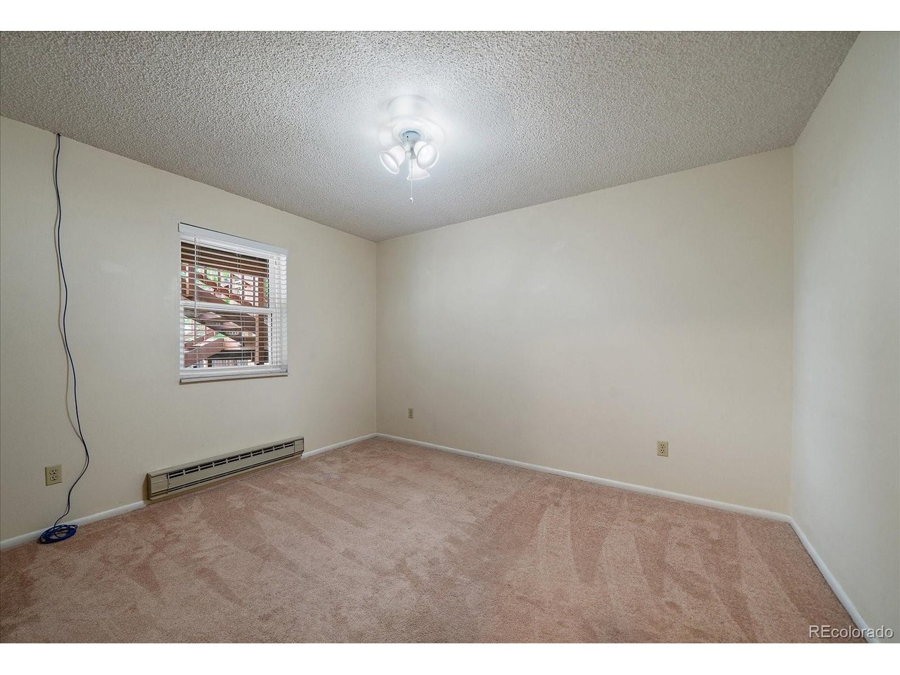 What a location!  Just minutes away from the Elementary School / High School and Downtown Castle Rock shopping! View of the ROCK and Pride of ownership in this NON covenant neighborhood! NEW ROOF JUNE 2026 with gutter guards! New Paint in some rooms, maintenance free vinyl exterior siding! Double pain windows. Carpets just cleaned HOWEVER seller is offering a 5k flooring allowance with accepted offer! Both bathrooms have been updated with tile and granite. Enjoy the backyard and it's privacy, with trees and a Tuff-Shed, plus have your backyard barbecues on this over-sized 600 Sq. Ft  Plus/minus 3 tiered deck. The huge garage is Over sized, 23' deep x 21' wide, and will fit a long bed pickup truck, is fully dry-walled and painted, plus a insulated overhead garage door with windows/light. The kitchen has been updated with custom-built 42" pecan cabinets!  All of the kitchen appliances are included. The Family-room walks out to the flat backyard. No active homeowners association either. BETTER HURRY, THIS HOME WON'T LAST!