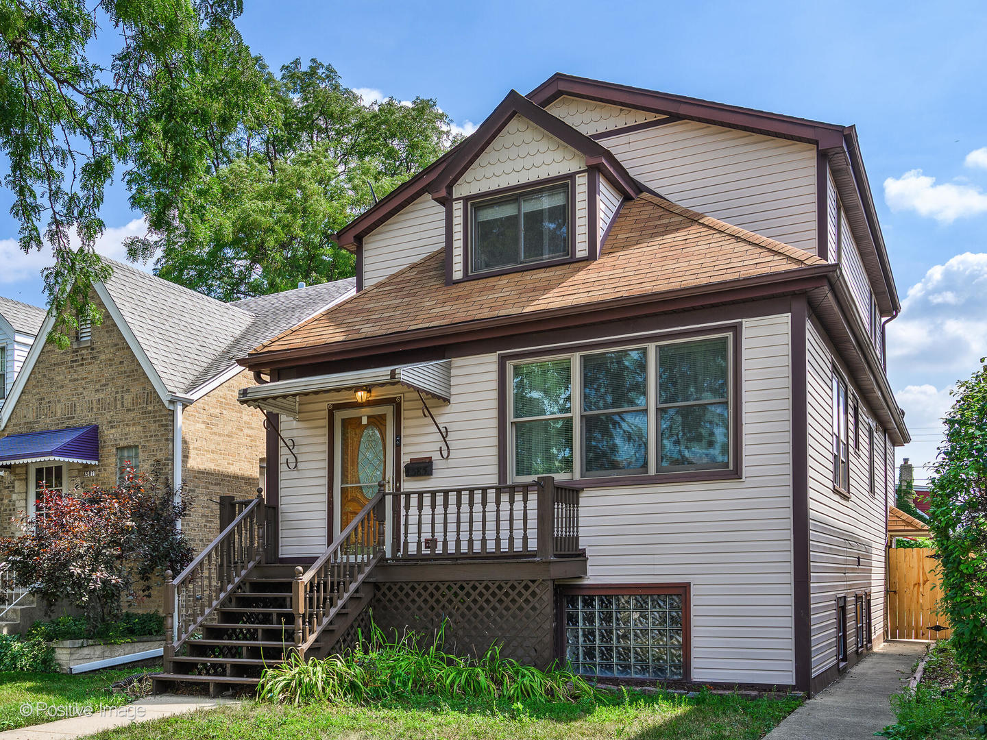 This thoughtfully renovated home blends classic charm with modern updates across three levels. Enter the first floor in a proper foyer, opening to a bright living room and dedicated dining room. The brand new kitchen, featuring stainless steel appliances, is bathed in natural light from two new sliding glass doors leading to a new deck! Completing the main level is a full bath, bedroom, and den - great for an office or walk in closet. Upstairs, you'll find three additional bedrooms, laundry, a spacious full bath with jacuzzi tub, and balcony. The finished basement adds even more flexibility with a fifth bedroom, second family room/flex room, plenty of storage, half bath, and a second laundry room. Out back, enjoy the large yard bordered by brand new fence, roomy deck for entertaining, and one-car garage with space to expand to two. All just steps from Dunham Park, Ridgemoor Country Club, and Wright College. Come enjoy all the beautiful updates the seller has made!