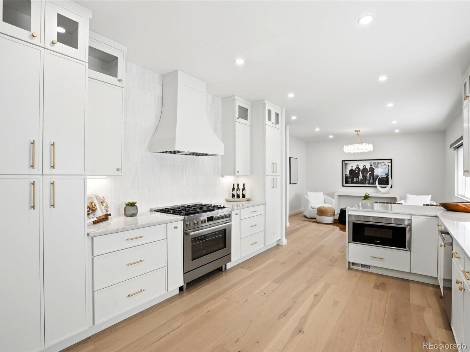 This beautifully renovated townhome in the highly sought-after gated community of Cherry Hills III. Offering over 2,552 square feet of thoughtfully designed living space on the main level and fully finished basement, this home features an open floor plan that is perfect for both everyday living and entertaining.The gourmet kitchen shines with premium quartzite countertops and flows seamlessly into the bright, open living and dining areas. A spacious primary suite awaits on the main level, complete with a luxurious 5-piece bath. Three additional bedrooms plus a versatile office provide flexible space for family, guests, or a home office. This home features true main level living with a 2 bedrooms 2 bathrooms plus office and laundry room on the main level.Step outside to your fully finished patio/sunroom — an ideal extension of the living space for relaxing or enjoying Colorado evenings.Cherry Hills III offers a true resort lifestyle with a private clubhouse, pools, sauna, tennis courts, streams, and ponds — all within a beautifully maintained, low-maintenance gated community.This is hands-down the best value in Denver right now for the quality of upgrades, square footage, and community amenities. Don’t miss your opportunity to own in one of the most desirable neighborhoods in the metro area.