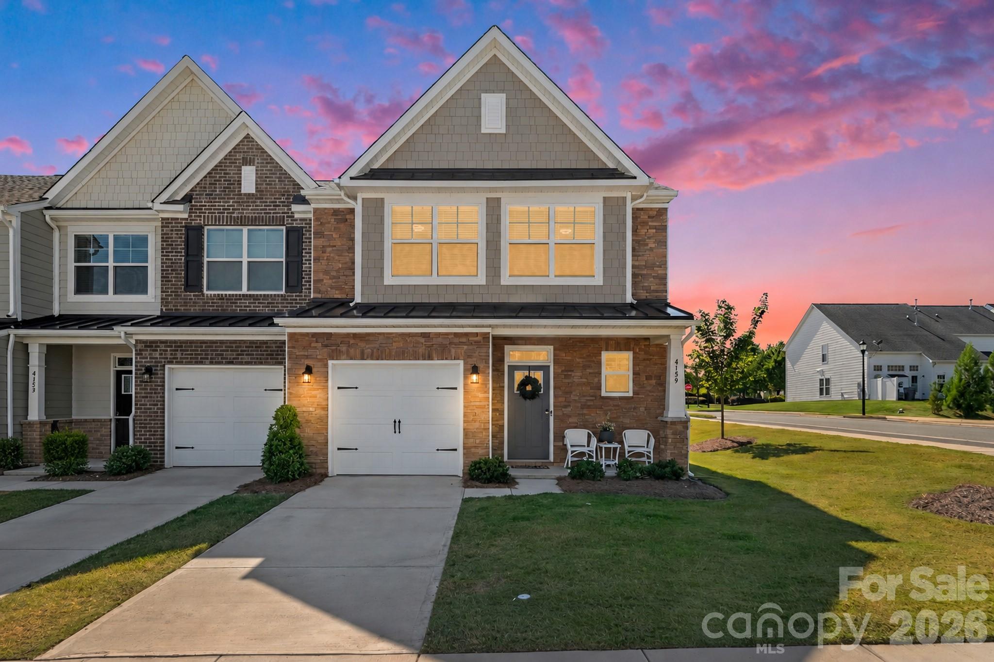 Like-new with a premier lot in Harrisburg Village, this end-unit townhome offers a rare combination of natural light, flexible living space, and the convenience of close by Harrisburg Town Center. Take advantage of the Cary floor plan which is the community’s only one with a main-level primary suite. A dramatic two-story living room fills the home with light, while the bright, neutral kitchen features white cabinetry, quartz countertops, and stainless steel appliances.Upstairs, you’ll find two additional bedrooms, a loft, and a flexible third room suited to an office, bonus room, or potential fourth bedroom. Lots of options with this floorplan! Step outside to a back patio with privacy from the protected tree line—a special setting that’s hard to find in today’s new construction. Harrisburg Village offers sidewalks, multiple pocket parks, and a beautiful community pool. Harrisburg Town Center, with its restaurants and local businesses, is a short walk or drive away.