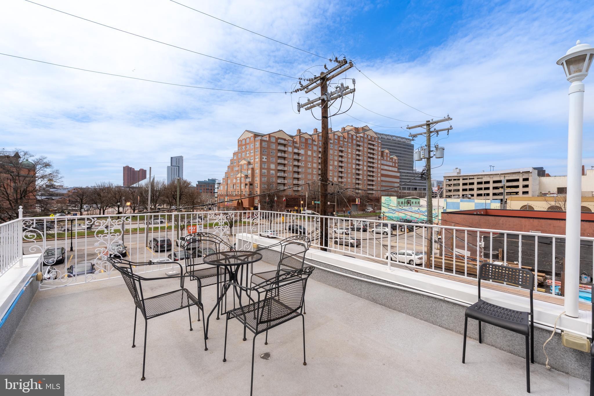 Stunning 3BR/2.5BA renovated townhome located in historic Little Italy. Enjoy the hardwood floors throughout, gourmet kitchen with high-end stainless steel appliances and granite countertops, massive main suite, custom wainscoting & trim, spa-like bathroom, large rooftop deck with stunning views of the Inner Harbor, and bonus room located in the basement. Third-floor loft space could be used as 3rd bedroom or additional living space. Steps away from Whole Foods, 24HR CVS, Starbucks, Waterfront, Inner Harbor, movie theater, restaurants, bars and upscale shopping.