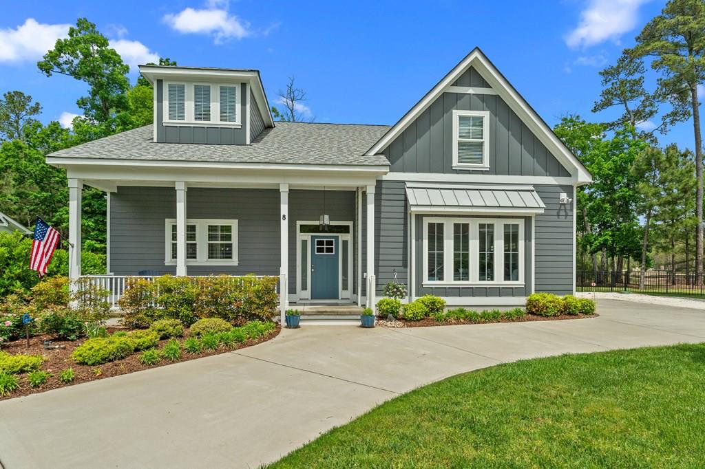 Contemporary Home in Bay Creek! This is your chance to own a stunning 2,900 sq ft Contemporary home in the  Hollies neighborhood and it won't last long! Designed for comfort, style, and flexibility, this home features two  primary suites, making it ideal for multi-generational living or hosting with ease. Step inside to soaring ceilings and a light-filled open floor plan that flow effortlessly into a spacious, fenced backyard overlooking a tranquil pond. Enjoy peace of mind and with a whole-house generator, tankless water heater, and irrigation system for the beautifully landscaped yard! Need more room? A 250 sq ft bonus room is ready to be finished for even more living space. SELLER IS OFFERING 35K at Closing towards Sports Membership Joining Fees.