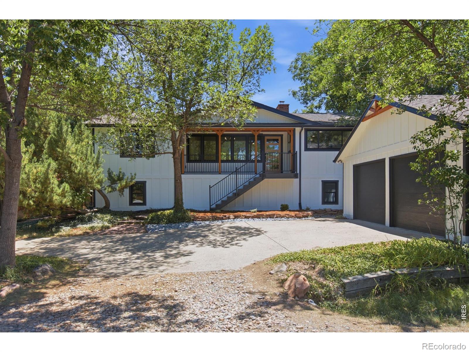 Newly renovated from top to bottom and nestled on the tree-lined, highly sought-after Redwood Avenue in North Boulder, this beautiful 4-bedroom home on .22 acres offers the perfect blend of character, comfort, and modern living. Rich with history, the home was relocated from 47th Street to its current foundation in 1984. The upper level features a luxurious primary suite, designer kitchen, and an inviting living room highlighted by large windows that flood the space with natural light. The walk-out lower level offers three additional bedrooms, providing flexible space for guests, a home office, fitness room, or creative retreat. Step outside to the expansive south-facing backyard-a mature MacIntosh apple tree and flagstone patio await. North Boulder offers the very best of Colorado living. Miles of scenic open space, hiking and biking trails, neighborhood parks, and the renowned Wonderland Lake. Nearby shopping and dining at local favorites such as Lucky's Market are minutes away. The home is located within the Boulder Valley School District and is within walking distance of Crest View Elementary and Centennial Middle School. Whether you're looking to put down roots or searching for a peaceful North Boulder retreat, this special Redwood Avenue home is ready for you.