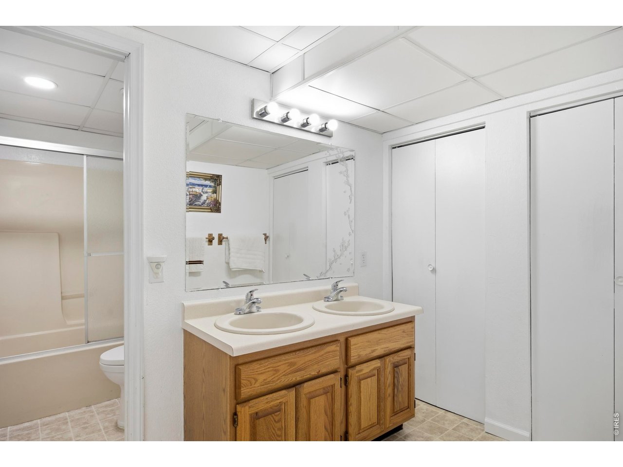 Charming 5-bed, 3-bath ranch with office and finished basement offers 3,358 sq ft of comfortable living. Pride of ownership shines throughout this pre-inspected home, giving buyers peace of mind. Major updates include a brand-new roof (2026), new furnace and A/C (2024). Enjoy an open-concept layout with a spacious kitchen, vaulted LR ceiling, beautiful wood floors, and a cozy LR fireplace. The main level features the primary bedroom and laundry. Outside, you'll love the immaculate fully fenced yard, raised garden beds, 2 sheds, and greenhouse. It's a gardener's delight! Located in a quiet neighborhood with no HOA or metro district. A true move-in ready gem!