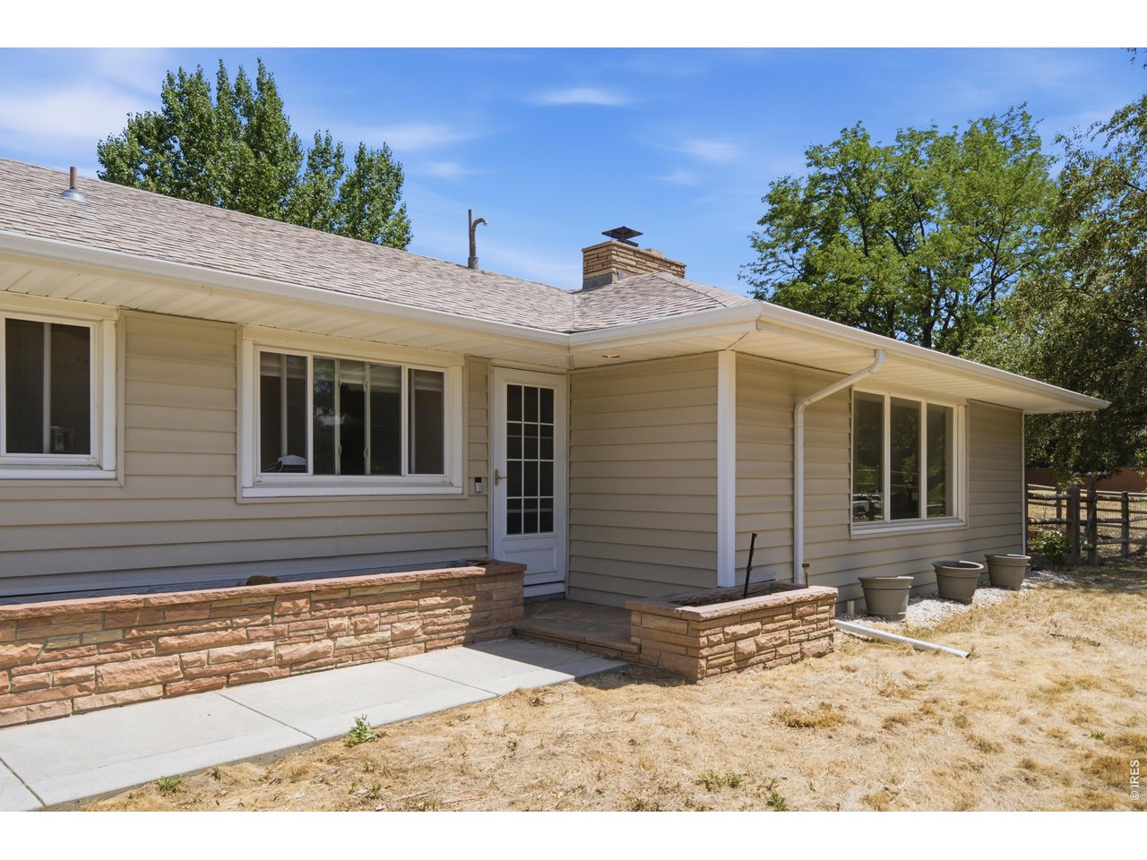 Discover the perfect blend of charm, character, and location in this inviting 2-bedroom, 1-bath home on one of Loveland's most picturesque sides of town. Featuring timeless mid-century modern style in the living room & kitchen along with a fully remodeled bathroom in 2018, this home offers a warm and welcoming feel with plenty of personality. The spacious lot includes an enclosed sunroom and two large storage sheds, providing extra space for relaxing, hobbies, or storage. Enjoy quick access to the Rocky Mountain foothills just minutes to the west, while shopping, dining, parks, and all the conveniences of Loveland are only minutes away in every other direction. A wonderful opportunity to enjoy the best of Colorado living!