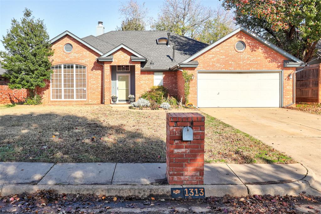 Talk about location. This updated brick house in the heart of Edmond is close to numerous shopping and dining amenities, and just minutes away from access to Broadway Extension. The living room features a beautiful gas fireplace, two large windows, and wood flooring.  Relax in the master suite with a vaulted ceiling in the bedroom, and a barn door that leads into the master bathroom. It also features a separate shower from the new whirlpool tub with modern tile surround, and a skylight that brings the most soothing noise when it rains.  Recent updates to this home include granite countertops in the kitchen, paint, and new lighting and hardware throughout the house. Enjoy your morning coffee on the back porch or host a barbecue on the large concrete patio. Roof was replaced in 2023 with impact-resistant shingles. You'll find this amazing home in the family-friendly neighborhood of Copperfield with a well-maintained community pool and park.