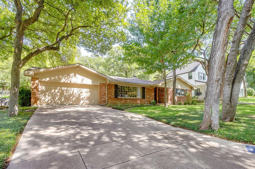 Welcome to this charming Tanglewood home that’s been lovingly maintained and is ready for its next chapter. From the street, you’ll notice the inviting curb appeal with shady trees and a welcoming front yard. Step inside, and the open living and dining areas instantly feel warm and comfortable. Perfect for both everyday living and entertaining. The kitchen is spacious and versatile, offering room for casual meals in the breakfast area as well as a separate dining space for when you’re hosting. Just beyond, a second living area gives you even more room to spread out, and it connects to a cozy enclosed sunroom (about 82 extra square feet not included in the official total) that makes a great bonus space. All bedrooms and bathrooms are tucked along a central hallway with plenty of storage and natural light throughout. Outside, the bi-level backyard offers grassy space for relaxing or play, backed by mature trees that add a sense of privacy. And for peace of mind, a brand-new roof was installed in 2023. Best of all, you’re within walking distance to TCU or a short golf cart ride from Colonial Country Club. Just minutes from shopping, dining, and parks that make this neighborhood so desirable. Showings are by appointment with at least a day’s notice—come see it for yourself!