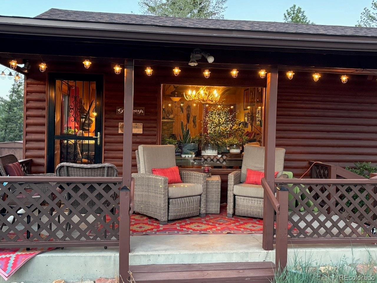 A jewel in the mountains! This beautifully remodeled log-sided cabin combines rustic mountain character with the comforts and finishes of a much newer home. Tucked into peaceful Chalk Creek Canyon on a quiet dead-end road near the end of the cul-de-sac, and surrounded by mountains, wildlife and endless opportunities for recreation, this is the Colorado cabin people dream about.Relax on the covered front porch and take in the view up Chalk Creek Canyon while listening to nearby Chalk Creek. Mt. Princeton Hot Springs Resort is within walking distance, with a homeowner pass included in the association dues. Nearby pond and horse-trail paths add even more ways to enjoy this special mountain setting.Inside, the open floor plan and vaulted ceilings make the home feel surprisingly spacious. Skylights that open, luxury vinyl plank flooring throughout, and a river-rock wood-burning fireplace create a warm, inviting mountain atmosphere. The completely remodeled kitchen features granite slab countertops and soft-close cabinetry and drawers. After a day in the mountains, unwind in the jetted tub-another touch that makes this cabin feel like a true mountain retreat.Recent improvements continue outside with brand-new Trex decking in the backyard, a custom sliding glass laundry room door, a flagstone patio and outdoor fire pit. A new roof with 50-year Owens Corning Storm Series architectural shingles was installed in 2021.Peaceful, beautifully updated and surrounded by some of Colorado's most spectacular scenery, this is more than a cabin-it's the quintessential cabin in the woods.